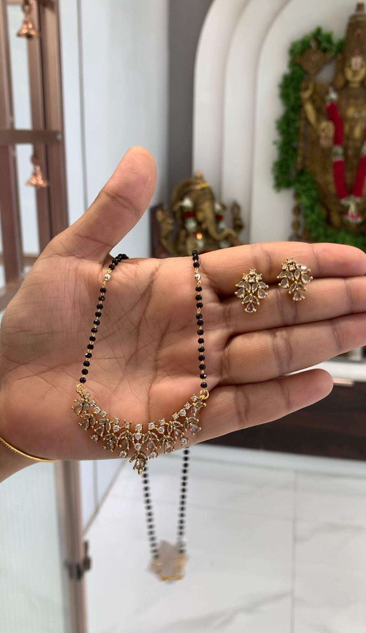 Beautiful white stone pendant set with black crystal beads chain 18 inchs long