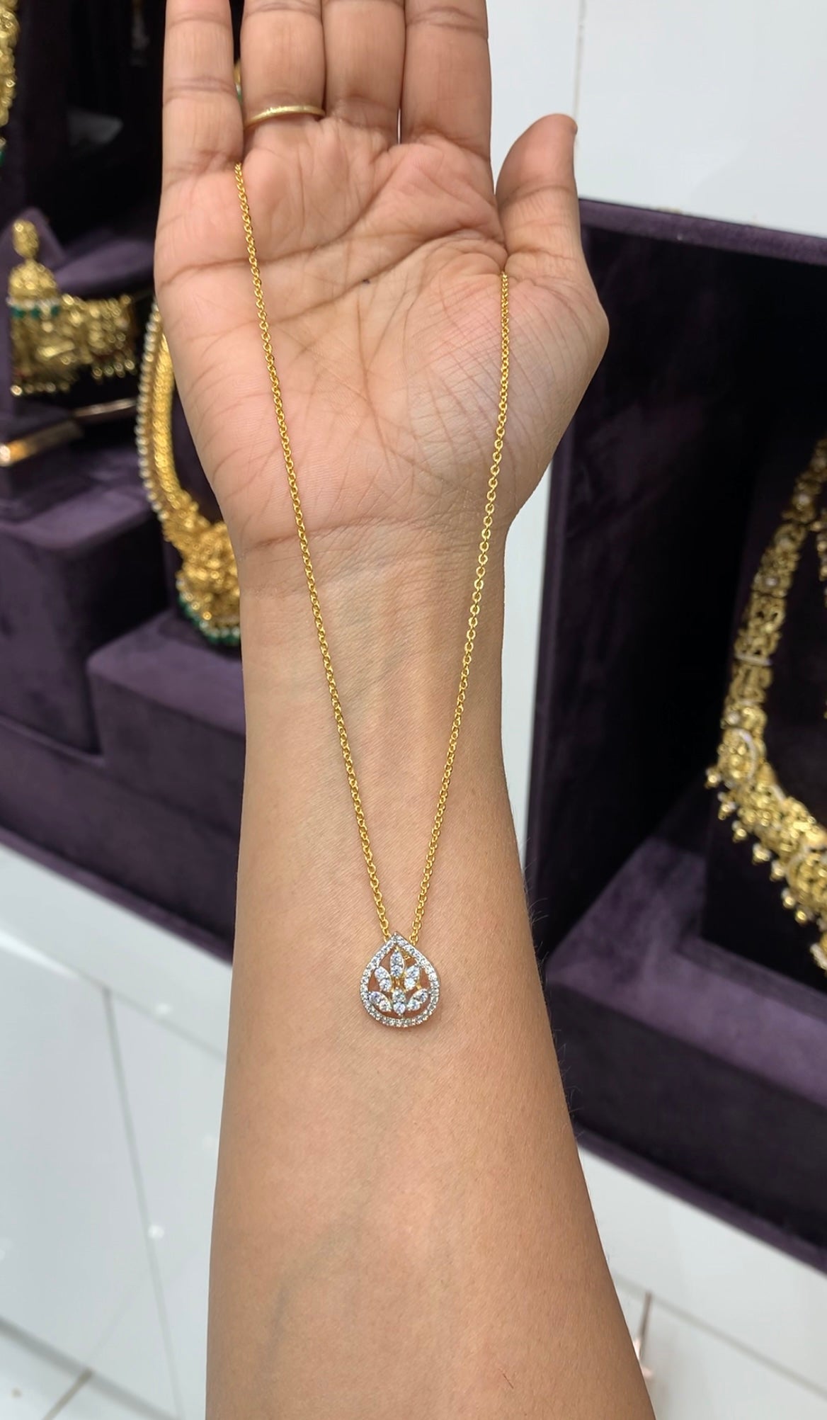Because white stone locket with chandraharam chain 18 inchs long