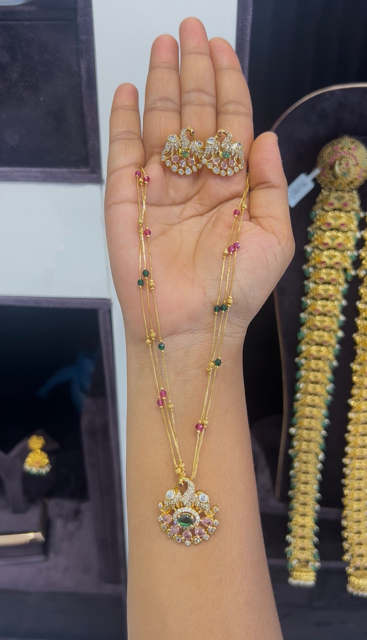 Beautiful peacock design pendant set with multi color 3layers chain 18 inchs long