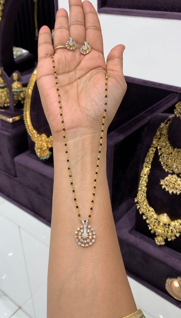 Beautiful white stone pendent set with black crystal beads mala 18 inchs long