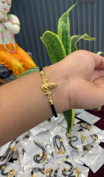 Beautiful balaji idol bracelet with black thread