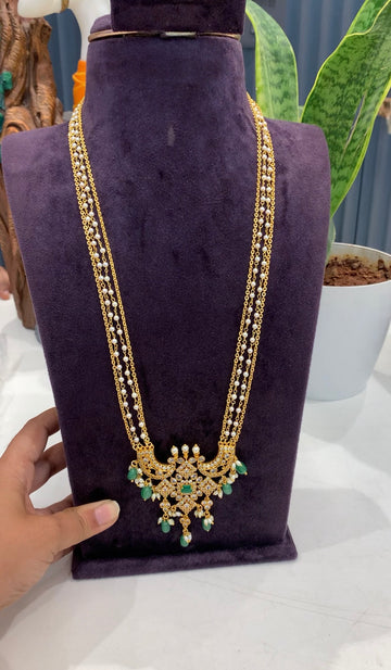 Beautiful CZ stones pendant with handmaking chandraharam & pearls chain 24 inchs long