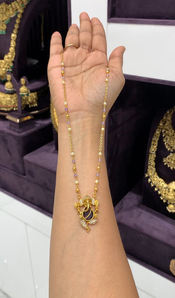 Beautiful ganesh pendent with handmaking pearls & chandraharam chain 18 inchs long