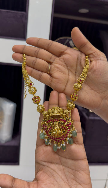 Beautiful jadau stone Lakshmi devi necklace with pushback ear hangings