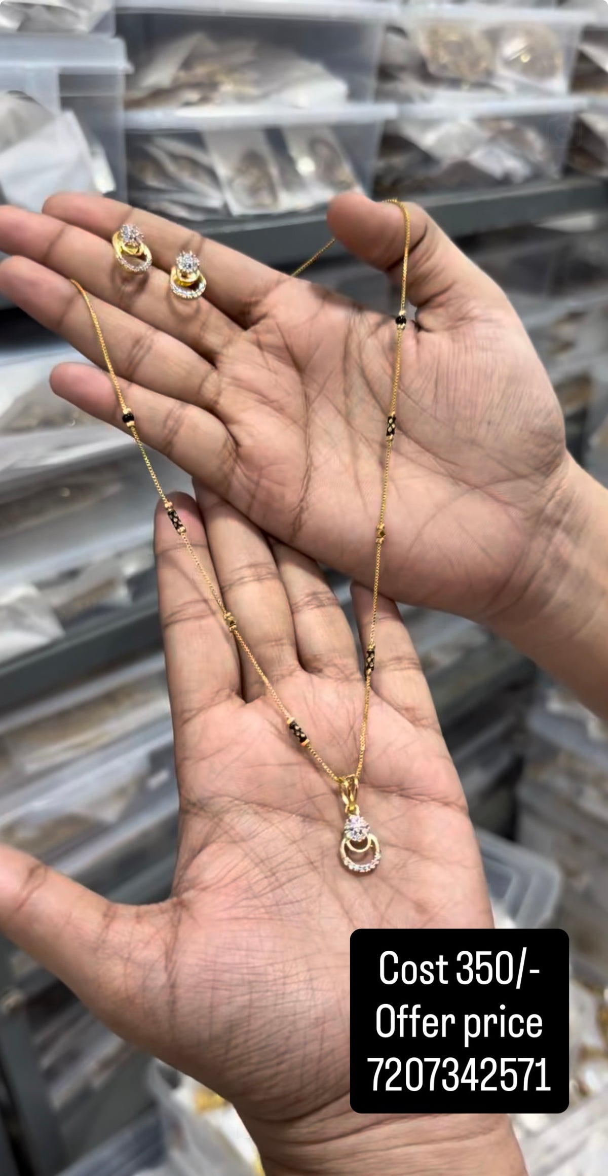 Beautiful white stone pendant set with blackbeads chain 18 inchs long