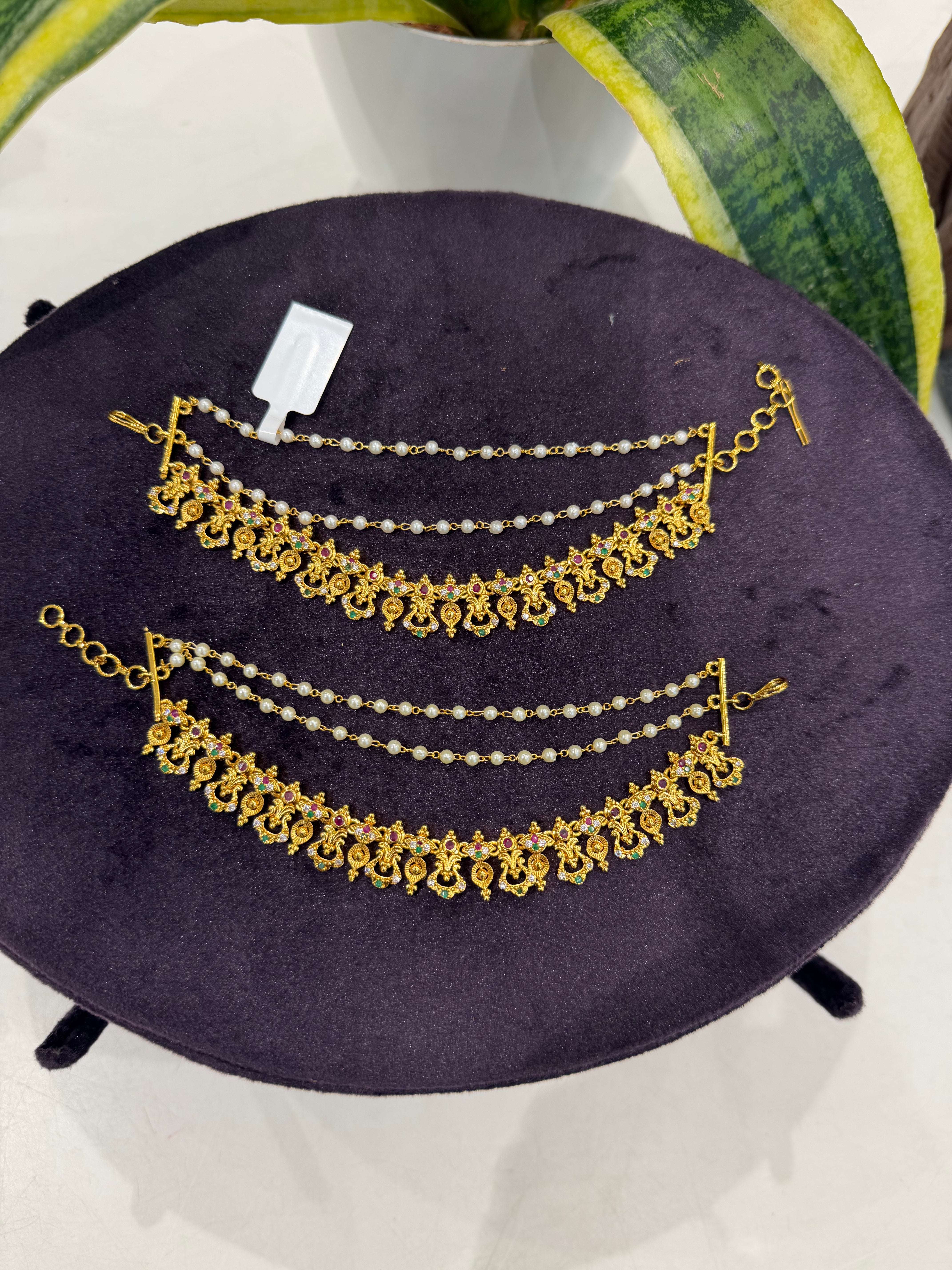 Beautiful  multi stone champaswaralu with pearls finishing