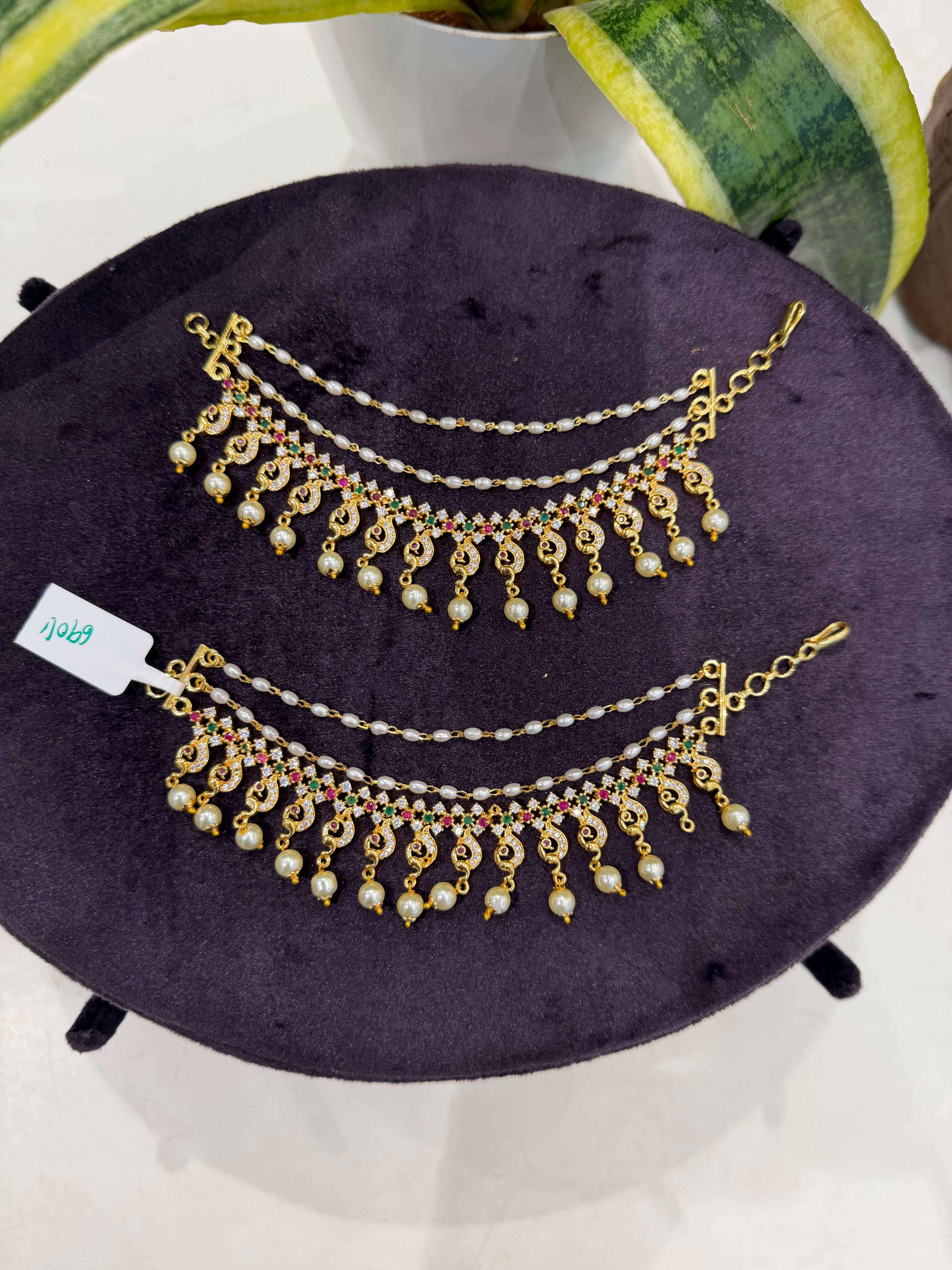 Beautiful peacock design multi stone champaswaralu with pearls finishing
