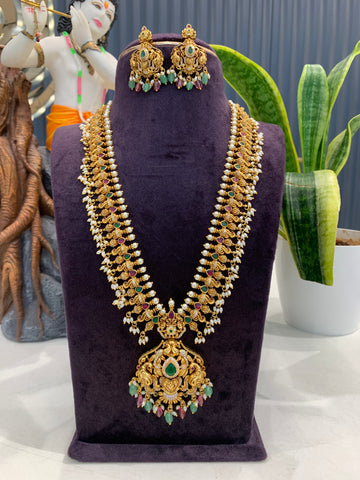 Beautiful multi color peacock design beads finishing long haram with screwback ear hangings