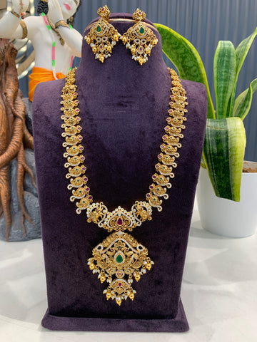 Beautiful CZ stones & peacock design long haram with screwback ear hangings
