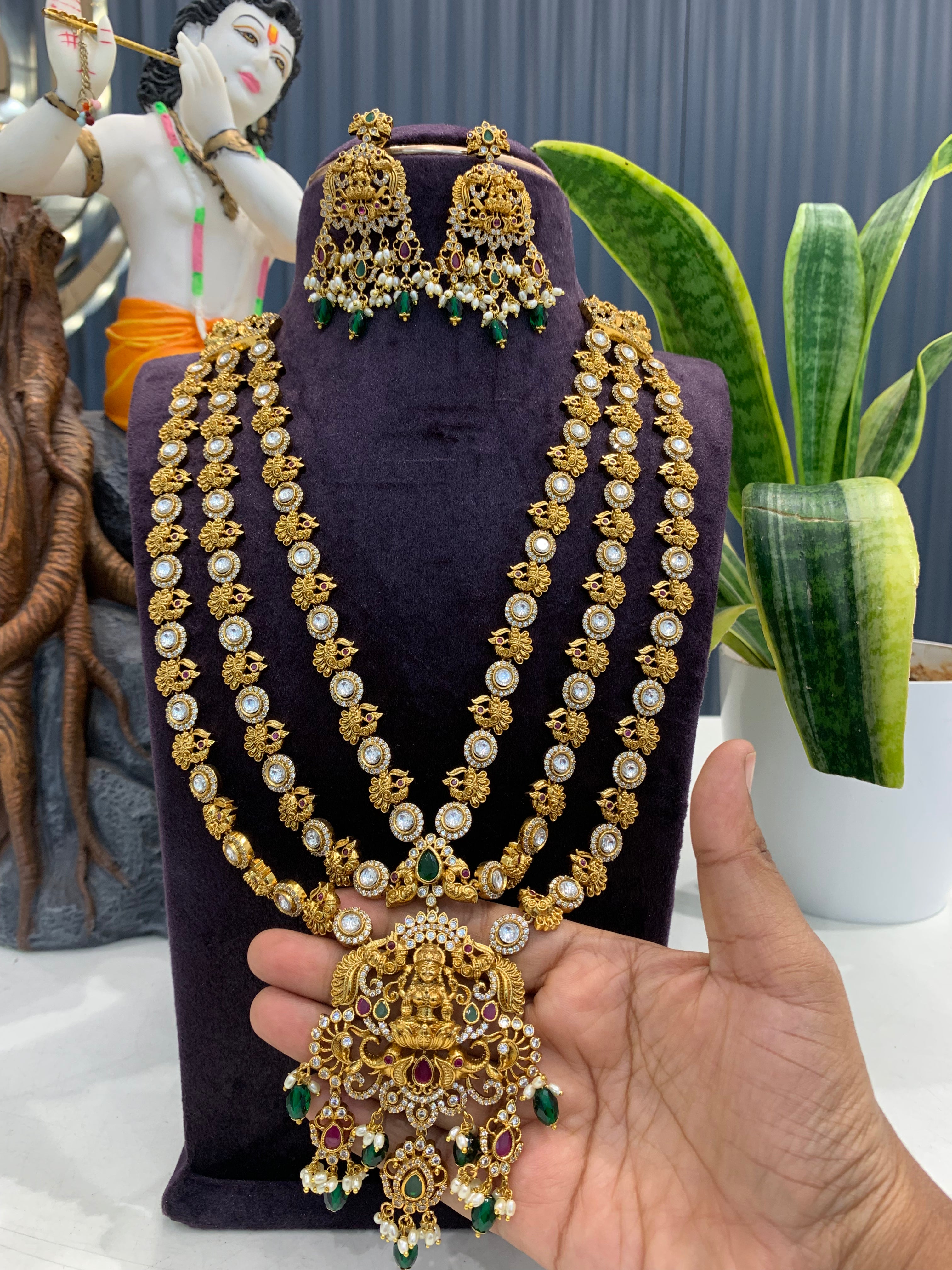 Beautiful Lakshmi devi & CZ stones 3 layers long haram with screwback ear hangings