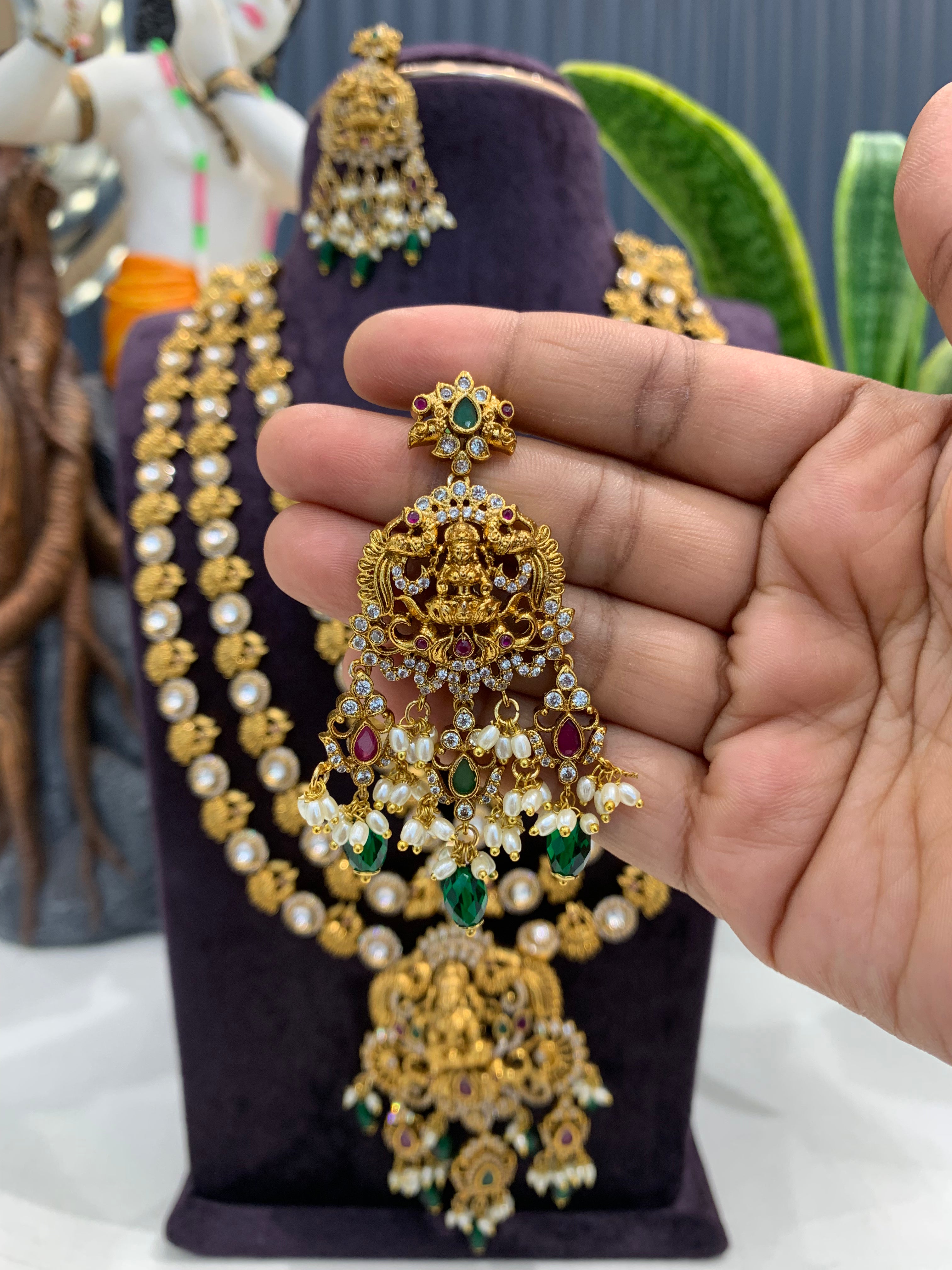 Beautiful Lakshmi devi & CZ stones 3 layers long haram with screwback ear hangings