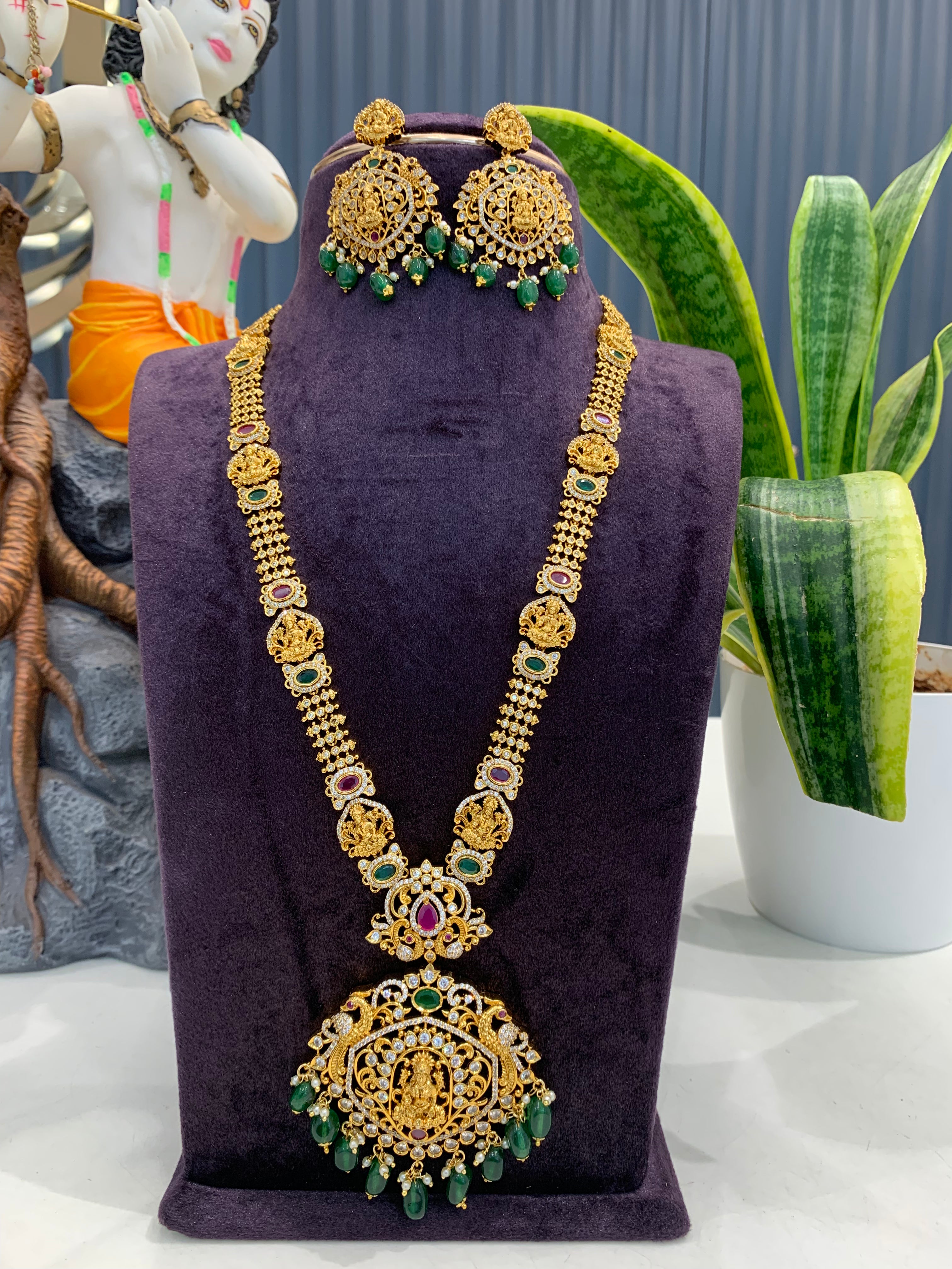 Beautiful Lakshmi devi & multi color CZ stones long haram with screwback ear hangings