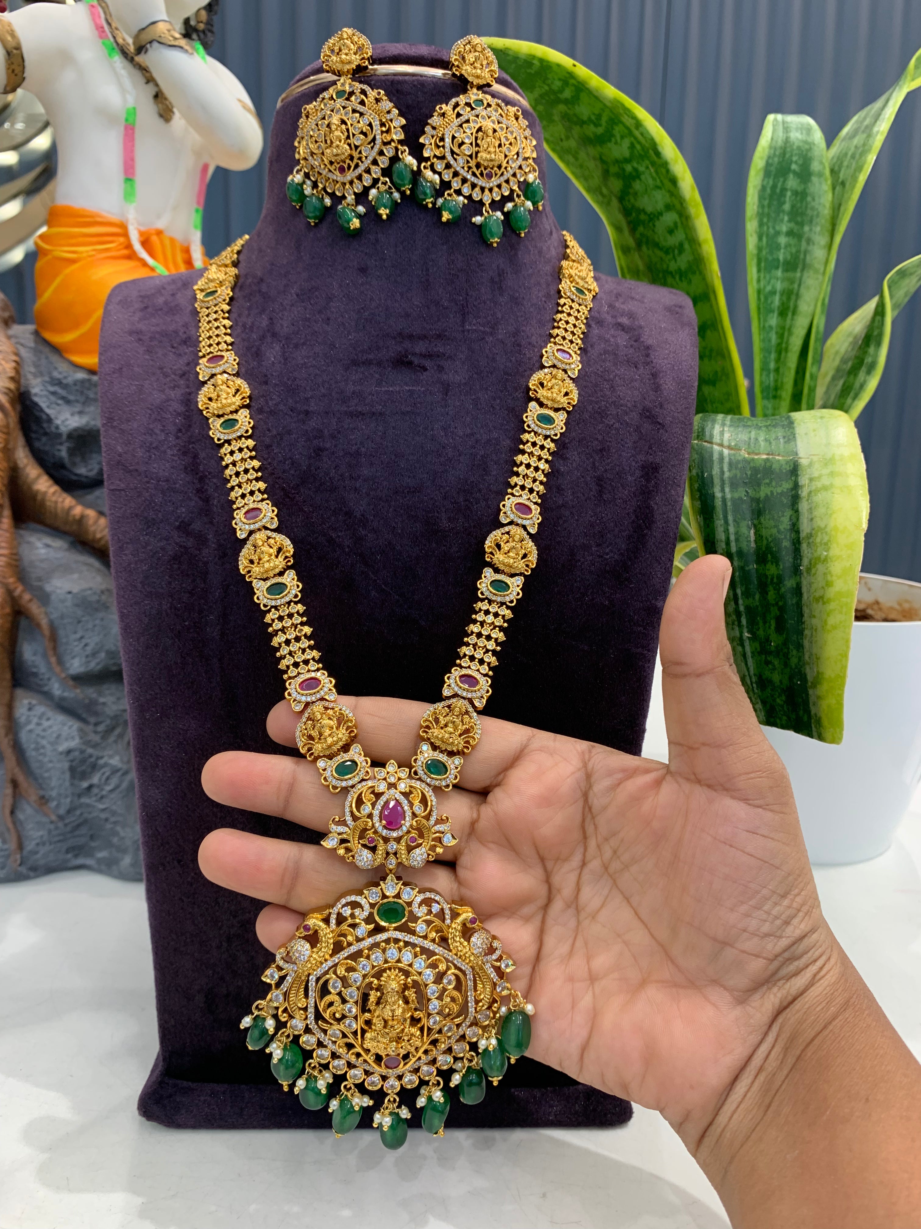 Beautiful Lakshmi devi & multi color CZ stones long haram with screwback ear hangings