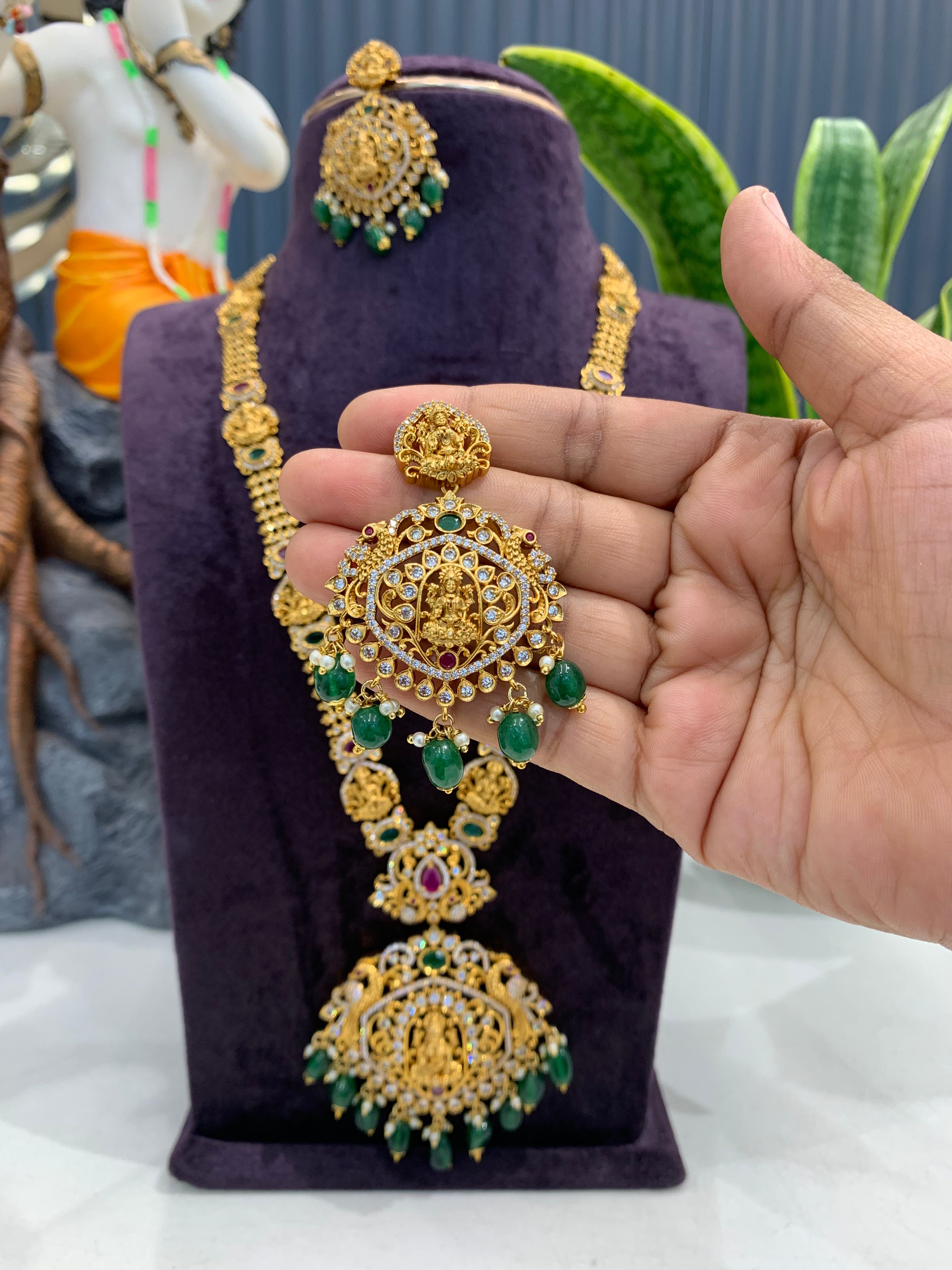 Beautiful Lakshmi devi & multi color CZ stones long haram with screwback ear hangings