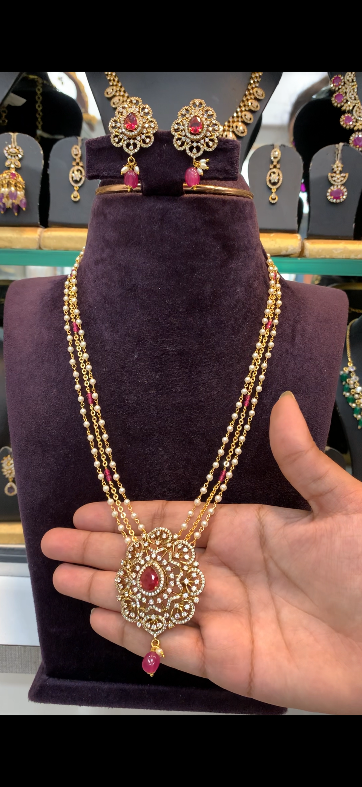 Beautiful ruby stone pendant with handmaking chandraharam & pearls mala 18 inchs long