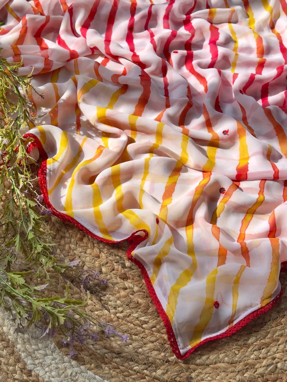 Beautiful leheriya printed pure georgette saree