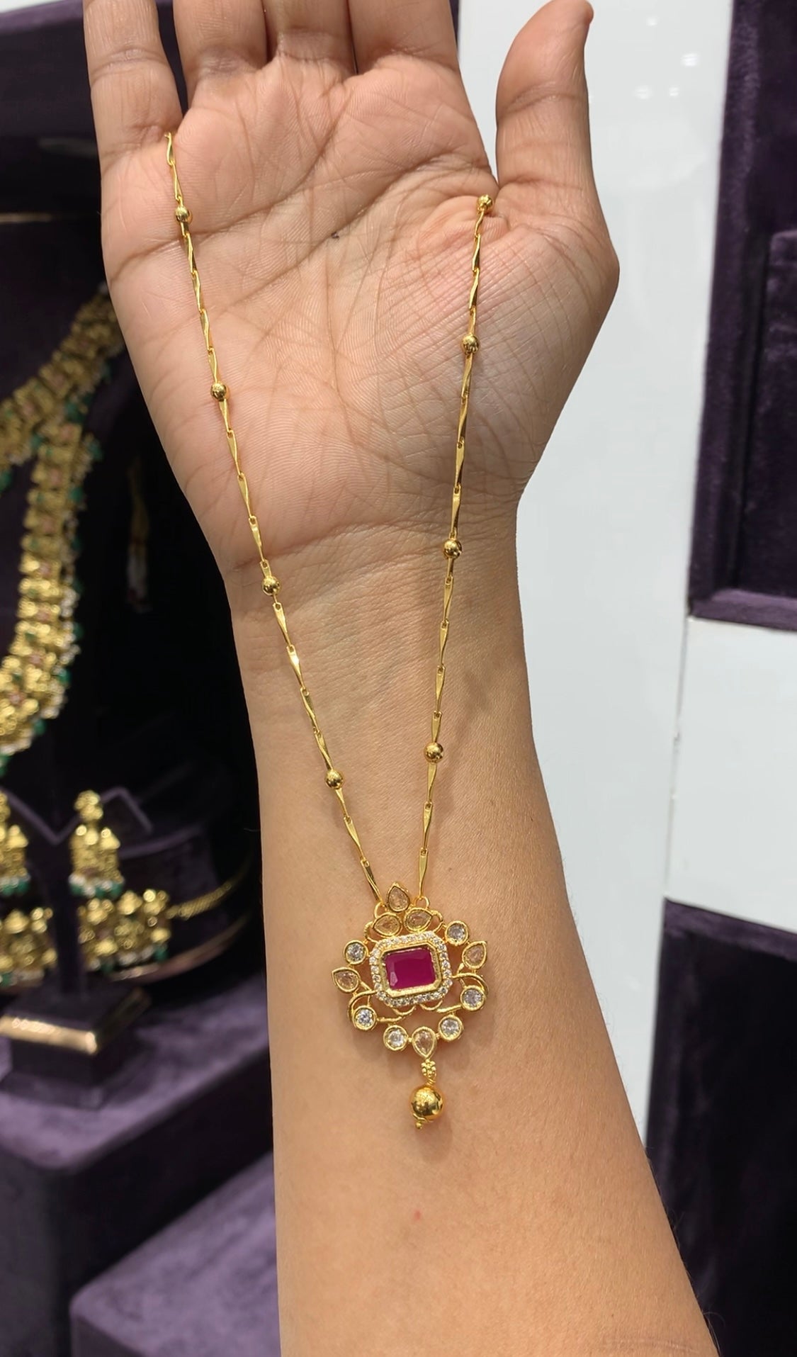 Beautiful pink uncut stone locket with chain