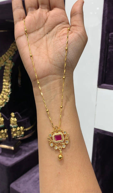 Beautiful pink uncut stone locket with chain
