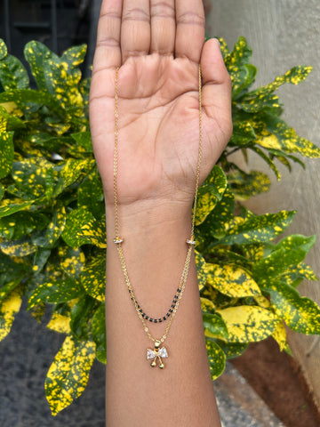 Beautiful simple white stone locket with blackbeads & chandraharam chain 18 inchs long