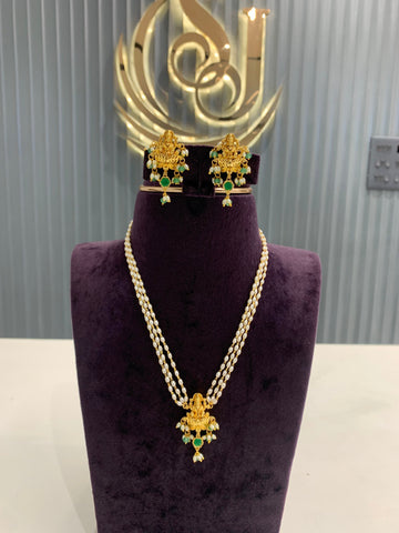 Beautiful pearls mala Lakshmi pendant set with pushback earrings
