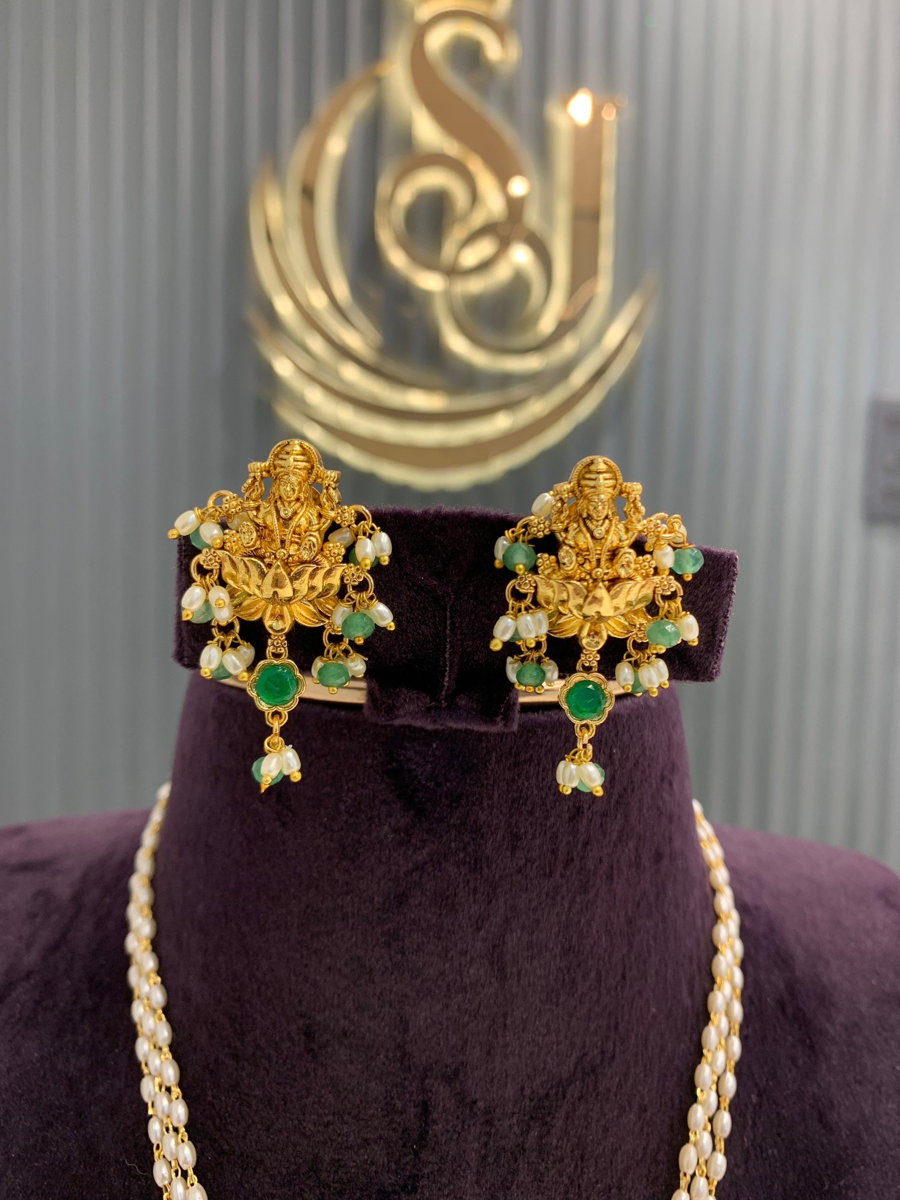 Beautiful pearls mala Lakshmi pendant set with pushback earrings