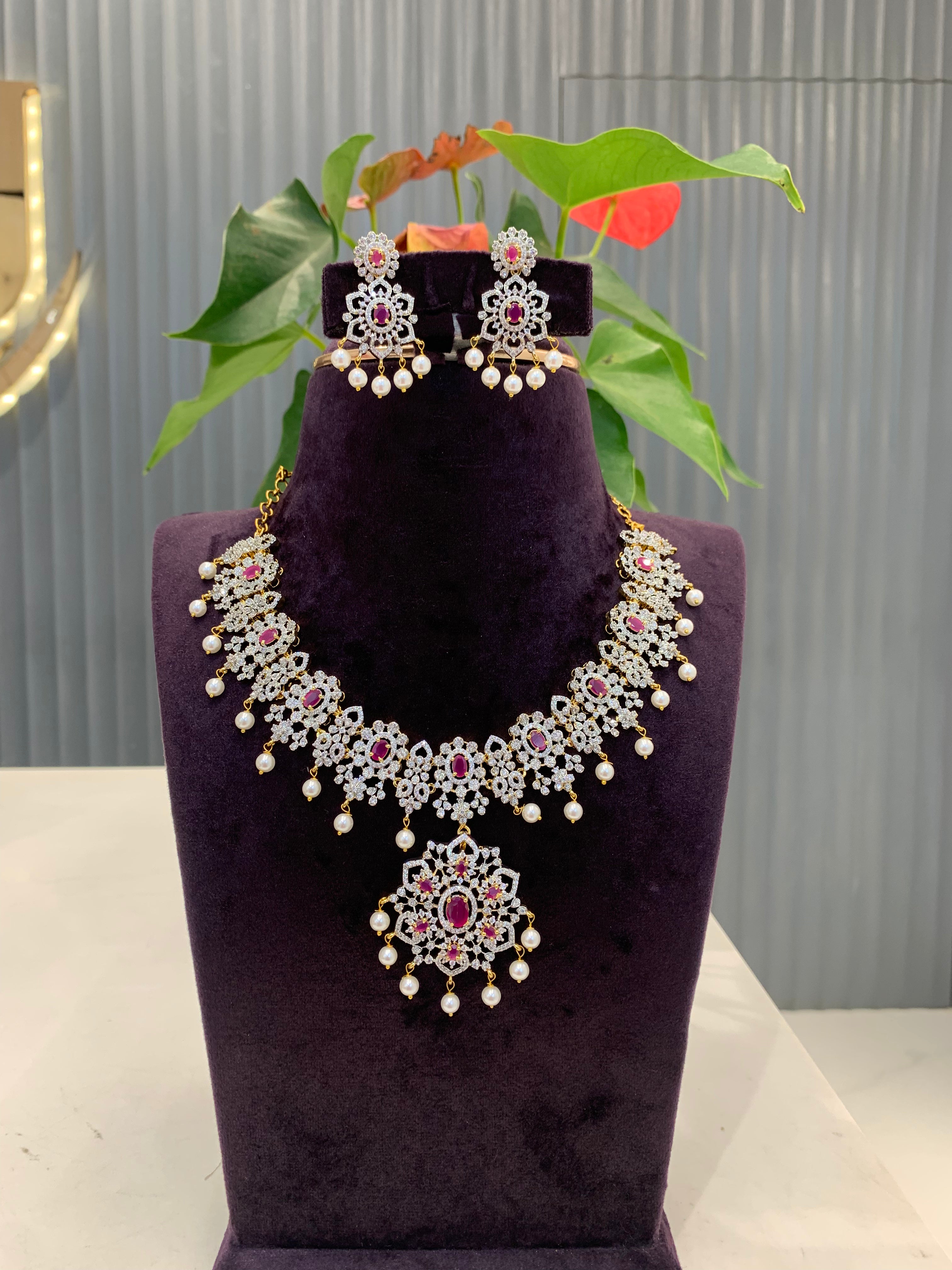 Beautiful GJ polish necklace with ruby stone and pushback earrings