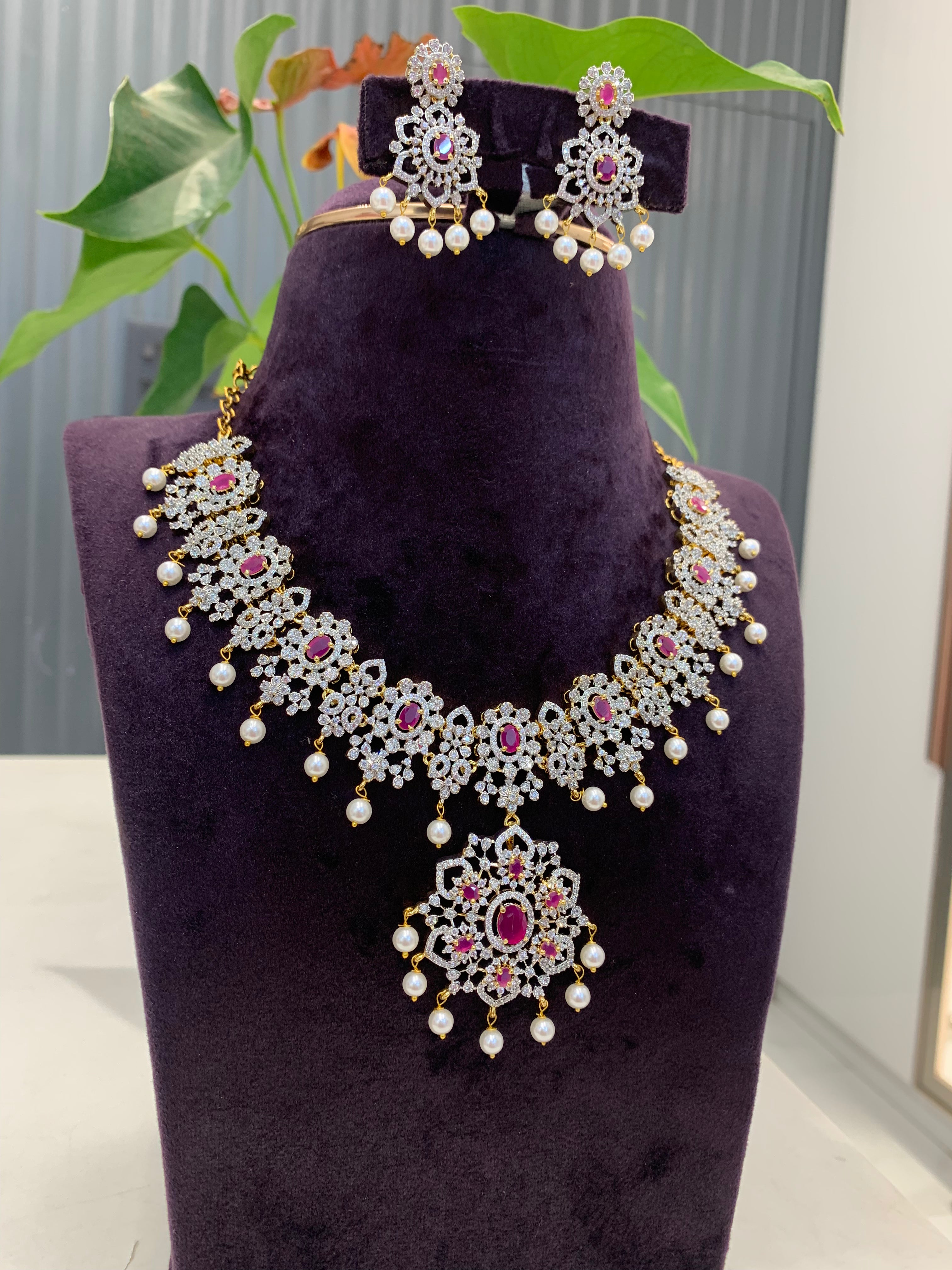 Beautiful GJ polish necklace with ruby stone and pushback earrings