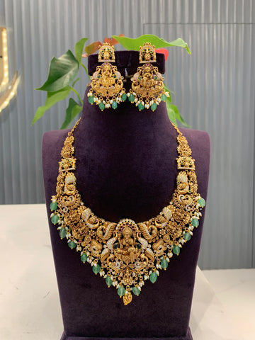 Beautiful Lakshmi devi mini haram with green beads and pushback earrings