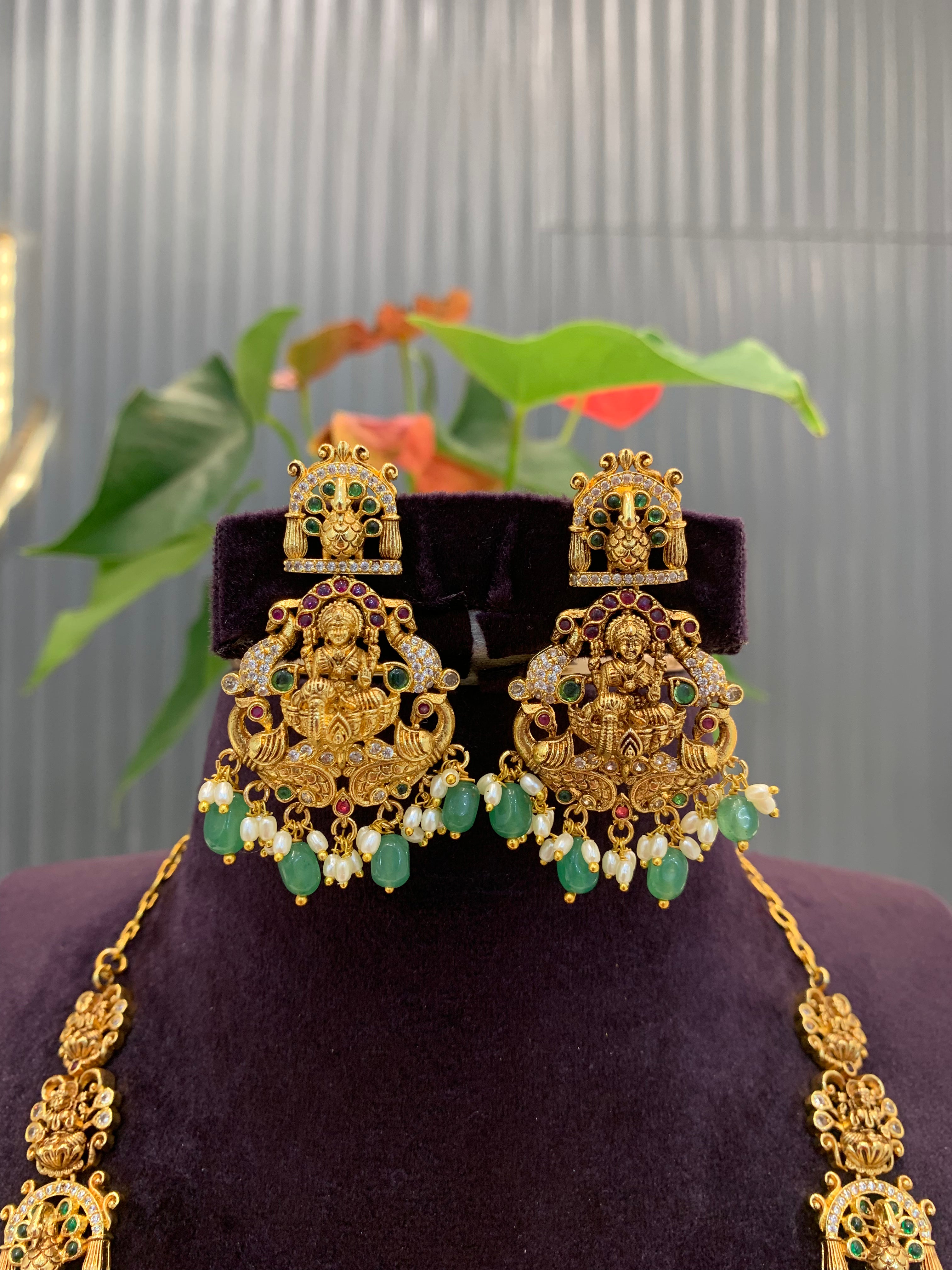 Beautiful Lakshmi devi mini haram with green beads and pushback earrings