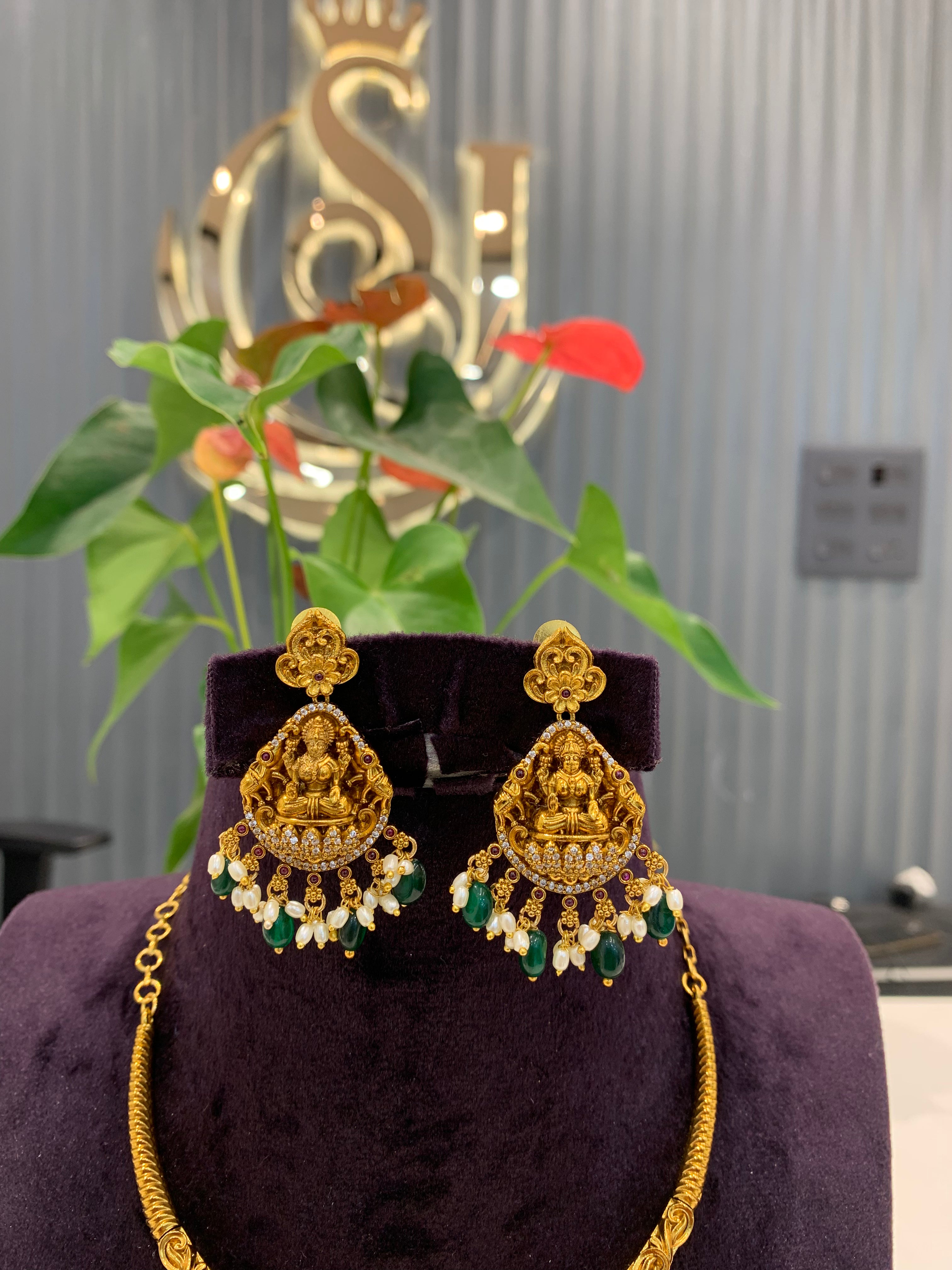 Beautiful Kanti necklace set Lakshmi pendant and earrings set with green beads