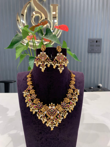 Beautiful peacock design necklace Jadav stone  with pearls and gold balls