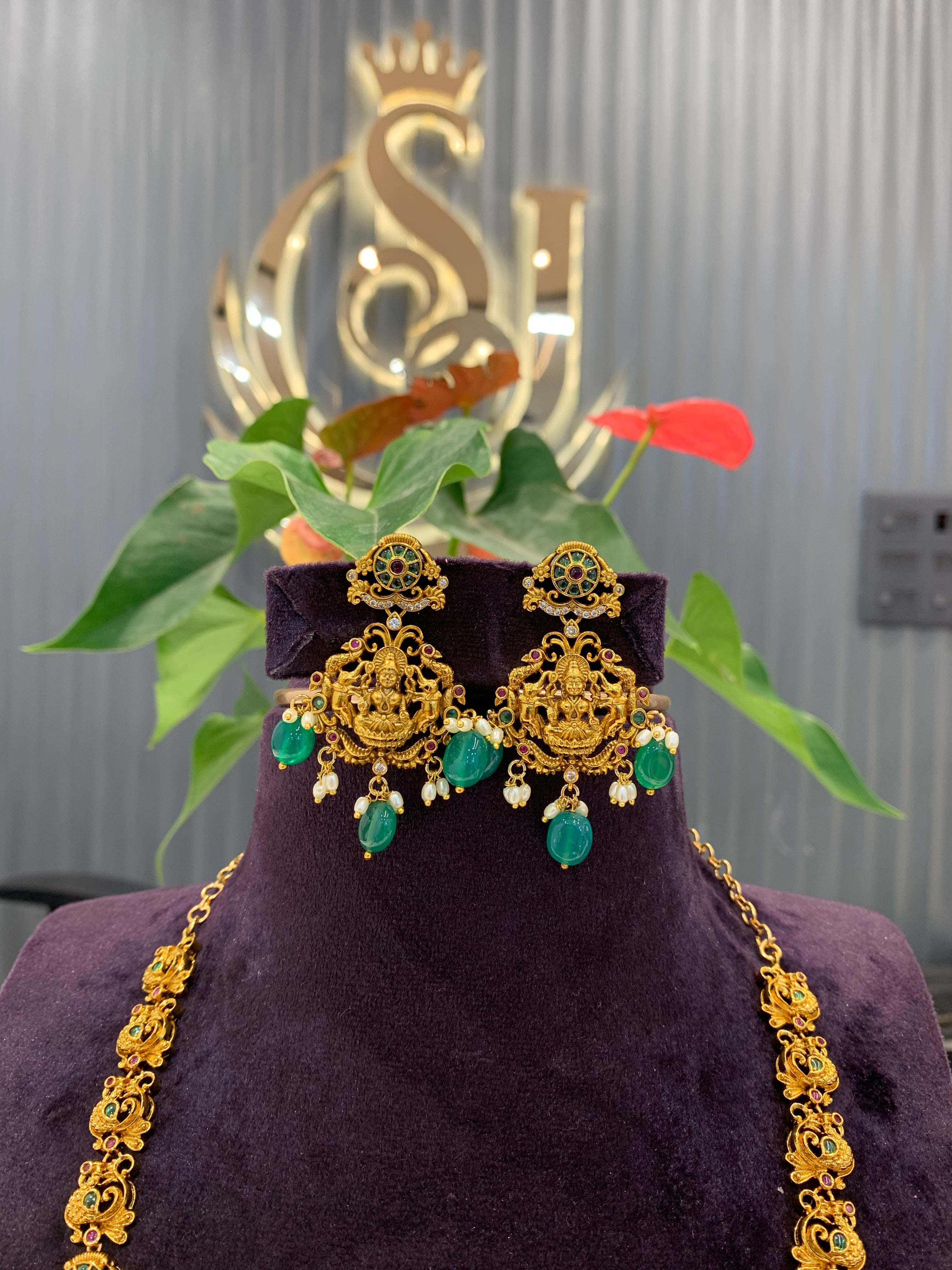 Beautiful Lakshmi pendant and pota stone long haram with green beads