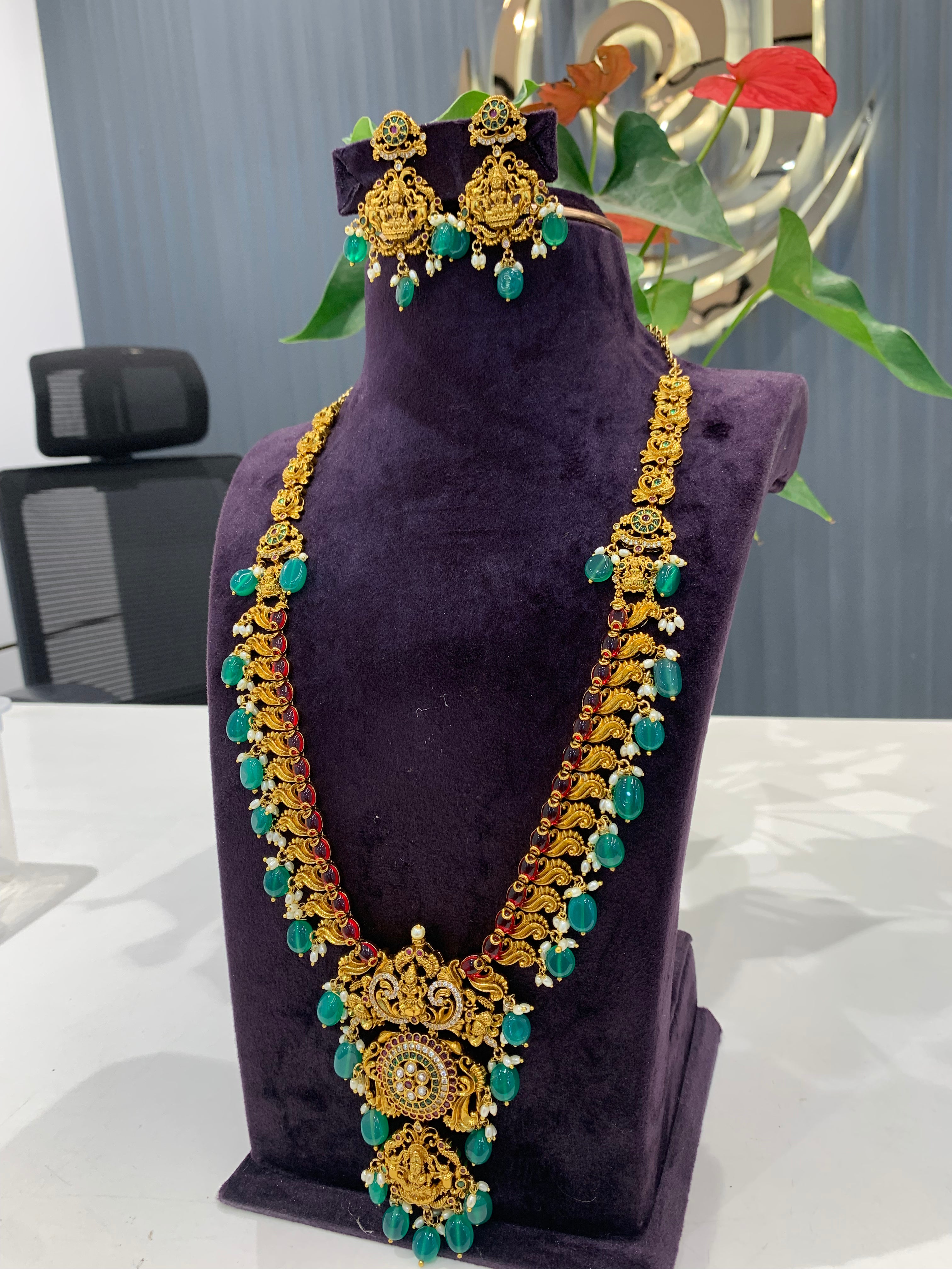 Beautiful Lakshmi pendant and pota stone long haram with green beads