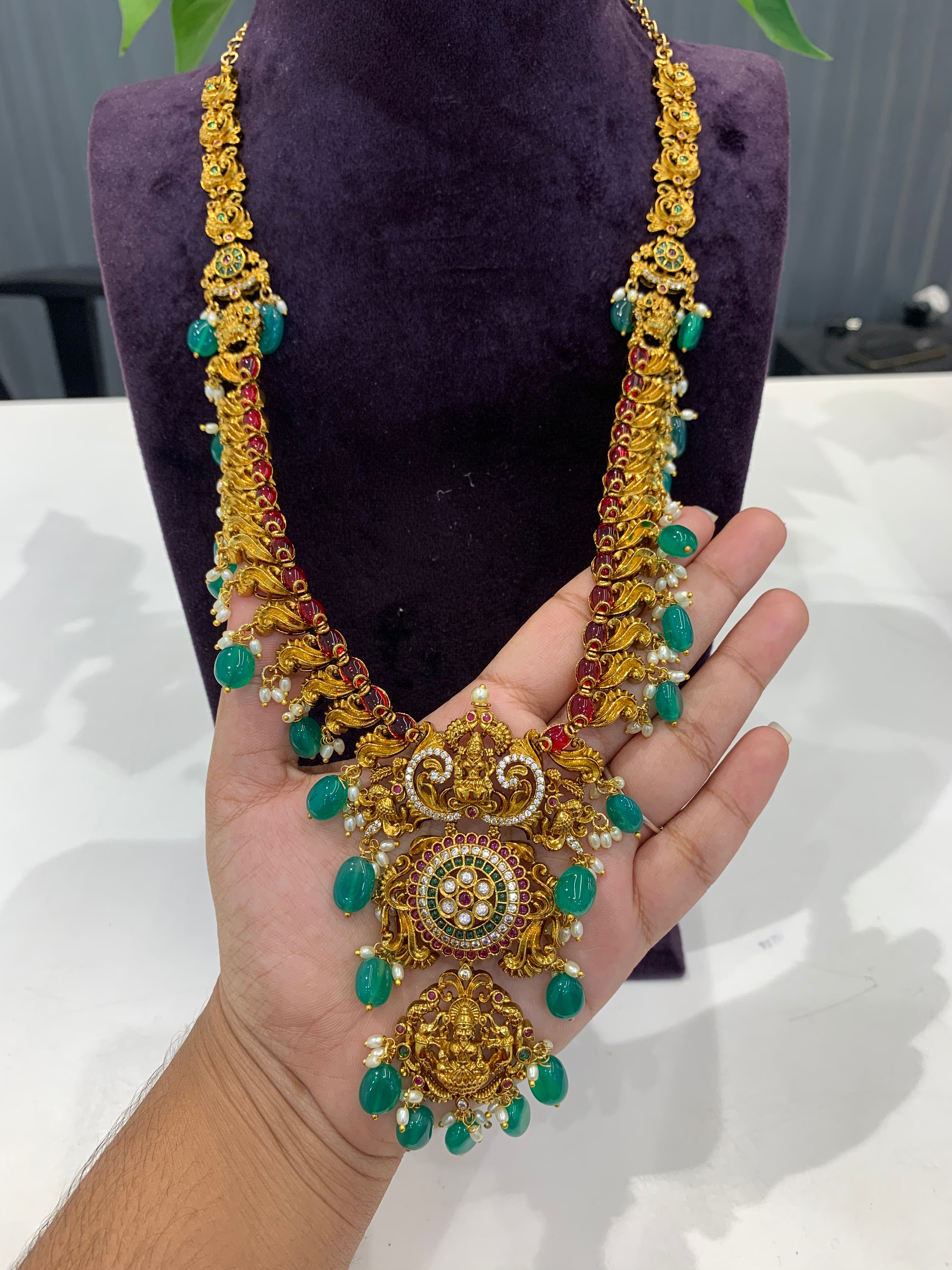 Beautiful Lakshmi pendant and pota stone long haram with green beads