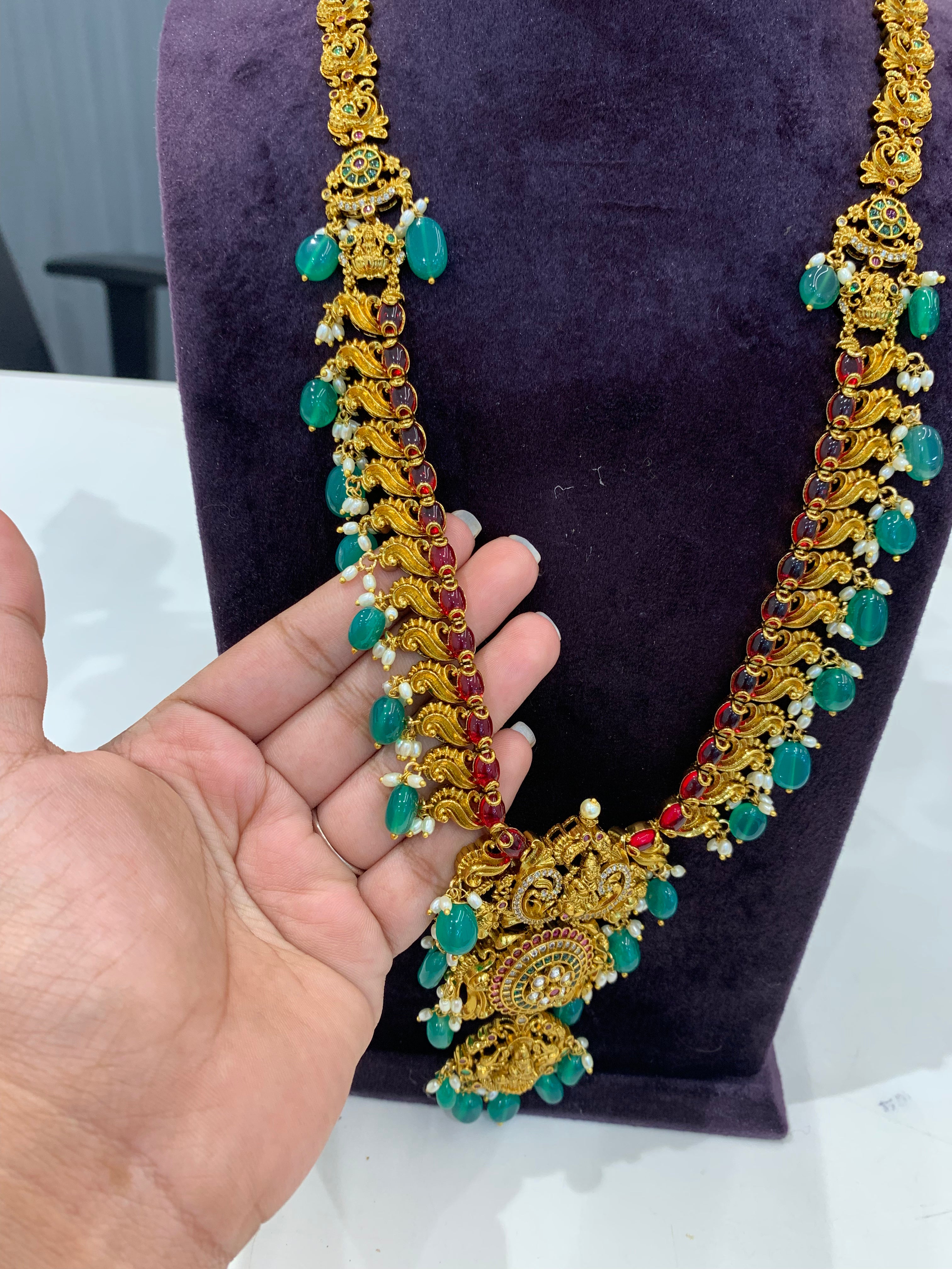Beautiful Lakshmi pendant and pota stone long haram with green beads