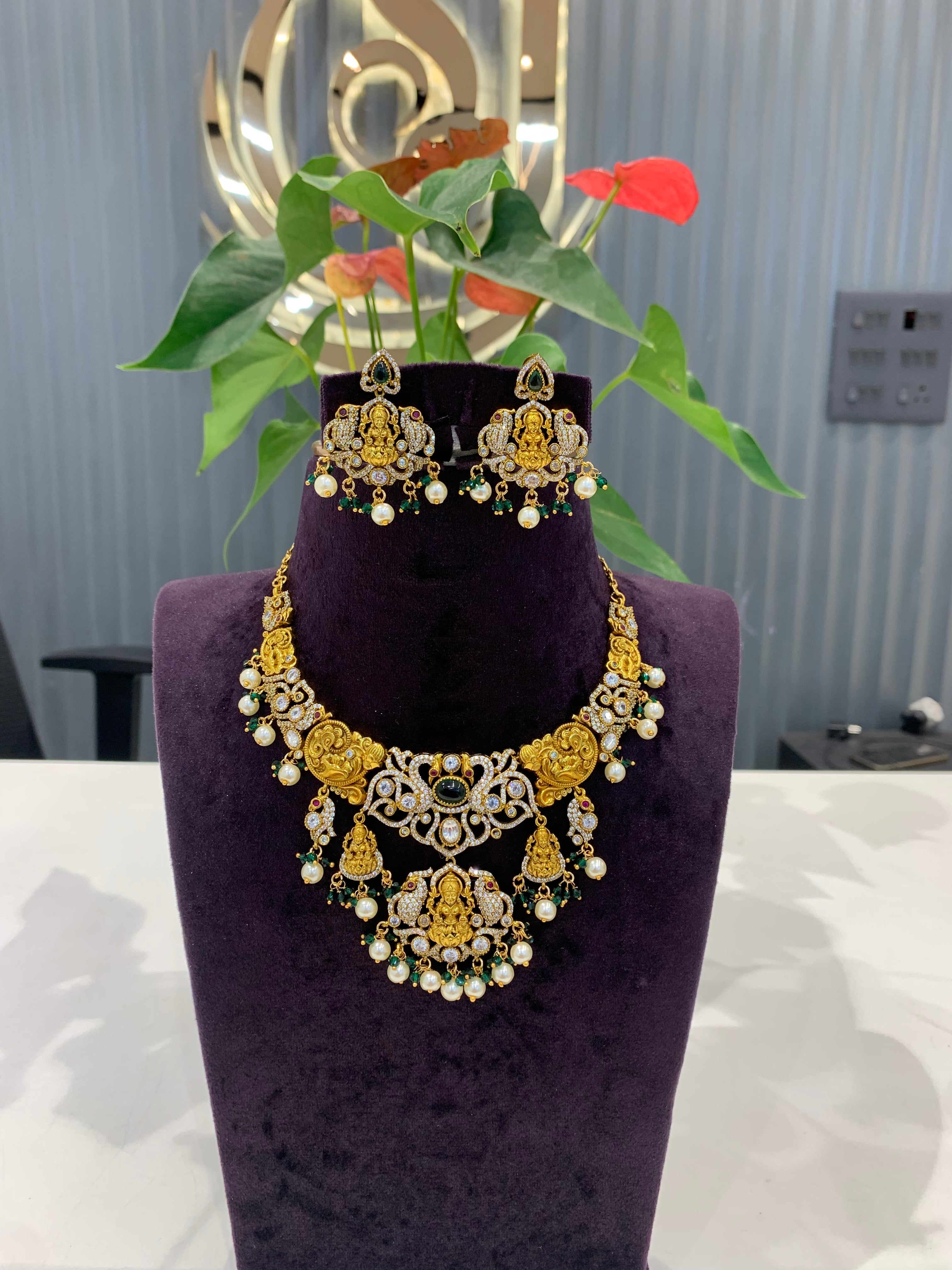 Beautiful cz stone peacock Lakshmi Devi necklace set with push back earrings