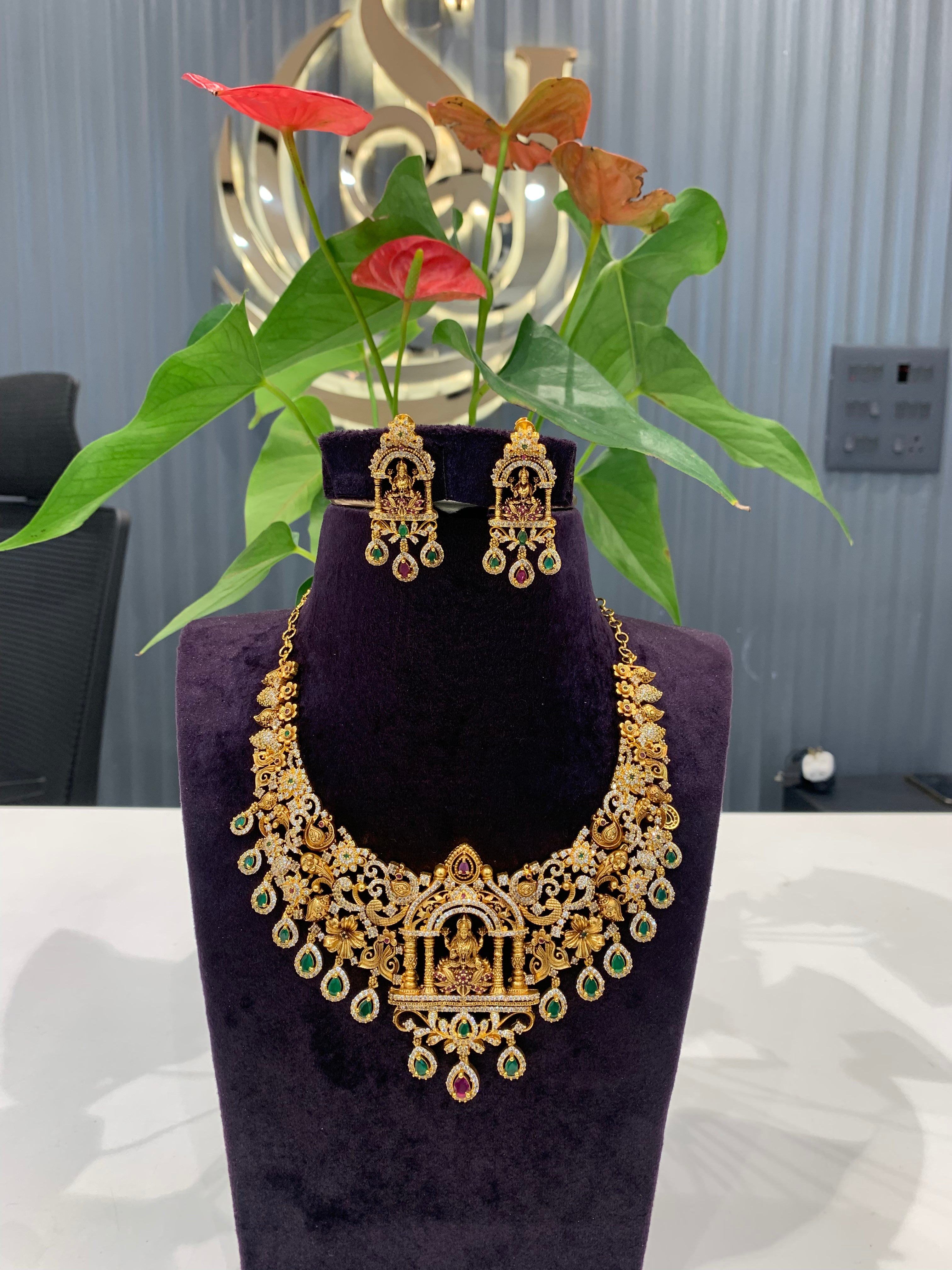 Beautiful  uncut polki -style with Lakshmi idol necklace and pushback matching earrings
