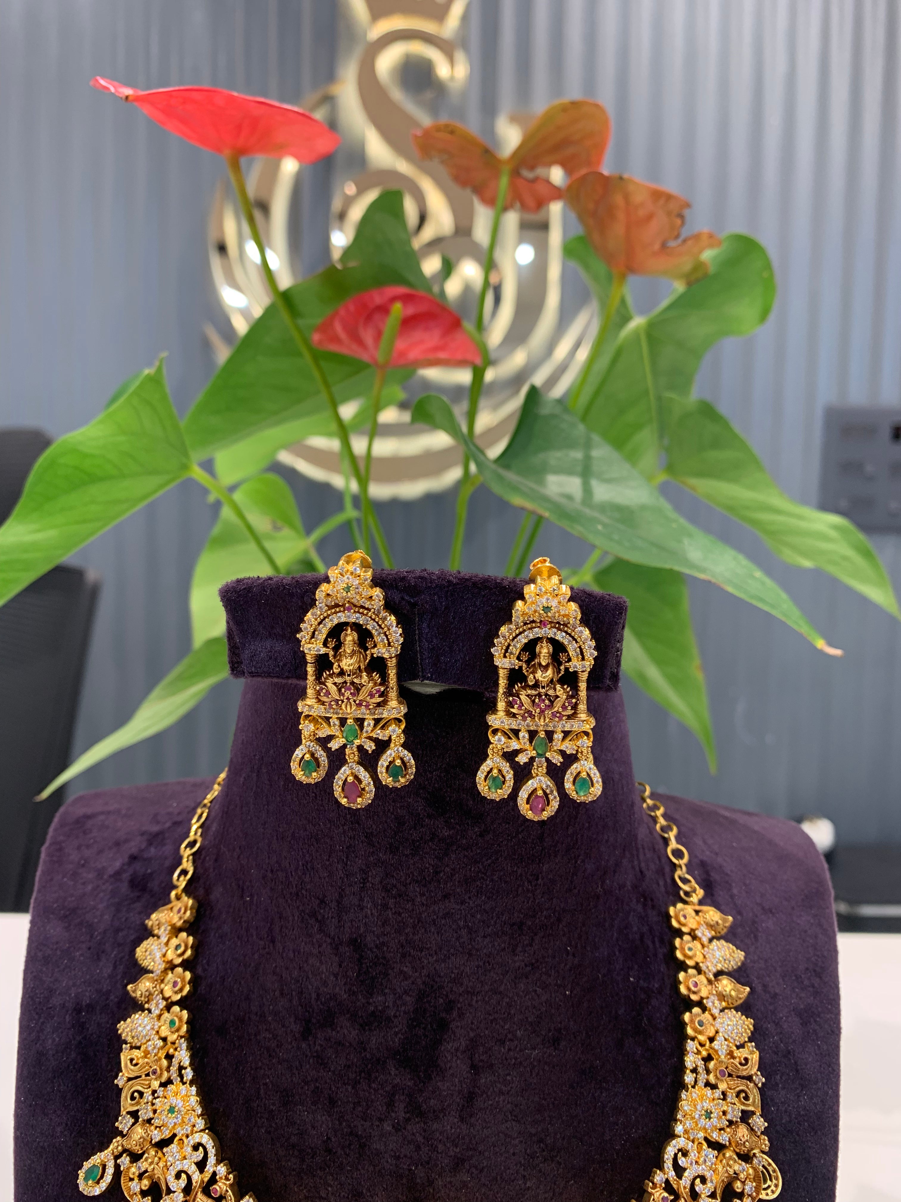 Beautiful  uncut polki -style with Lakshmi idol necklace and pushback matching earrings