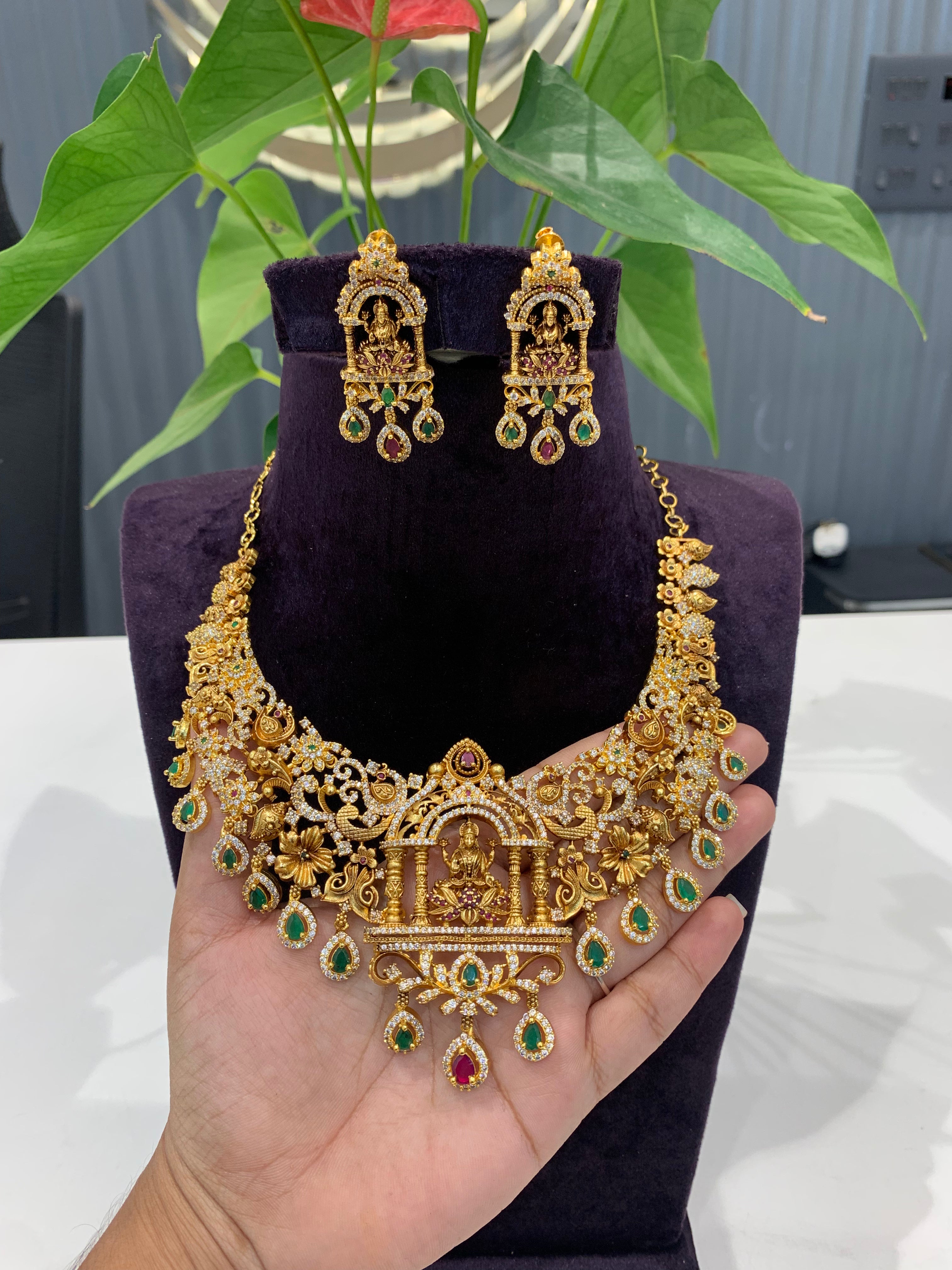 Beautiful  uncut polki -style with Lakshmi idol necklace and pushback matching earrings