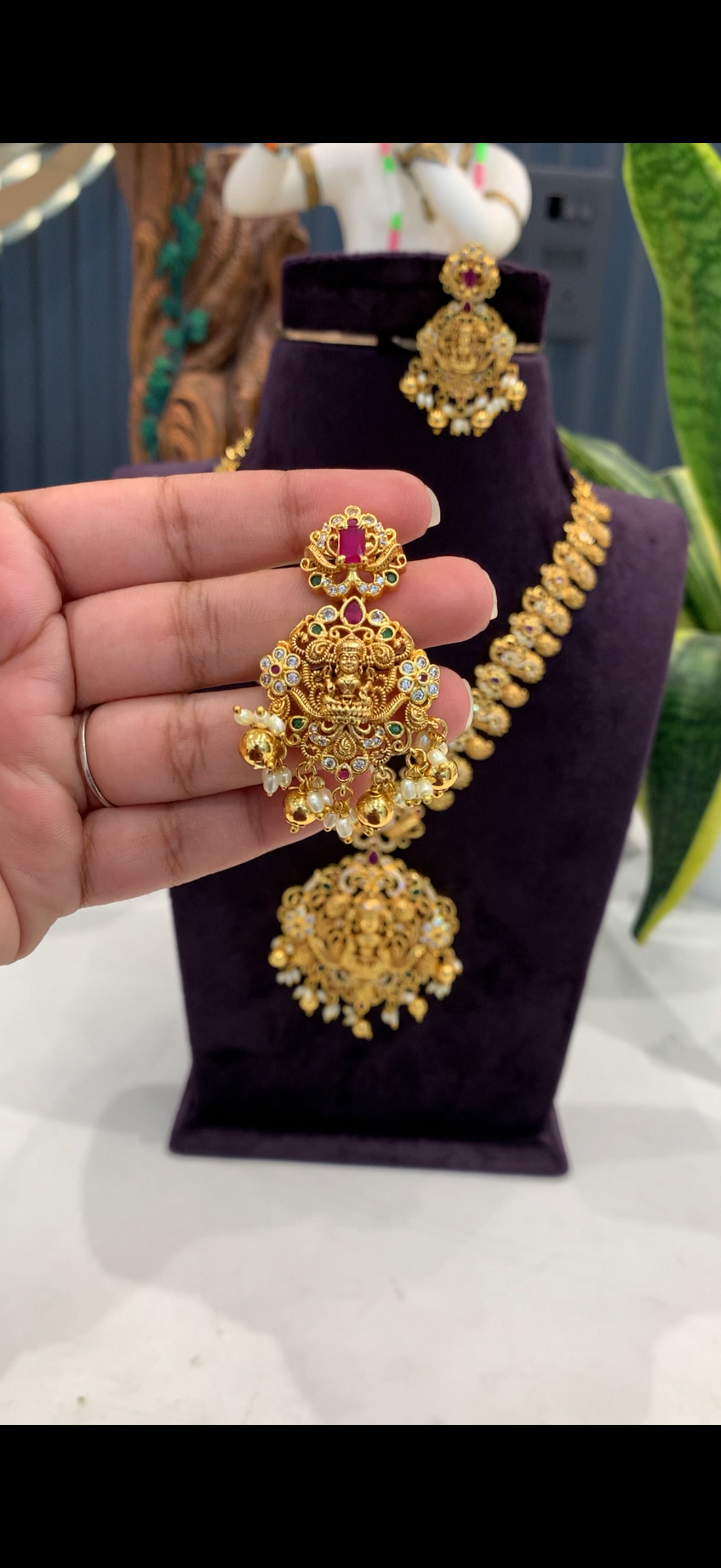 Beautiful peacock and Lakshmi pendant necklace with pushback earrings