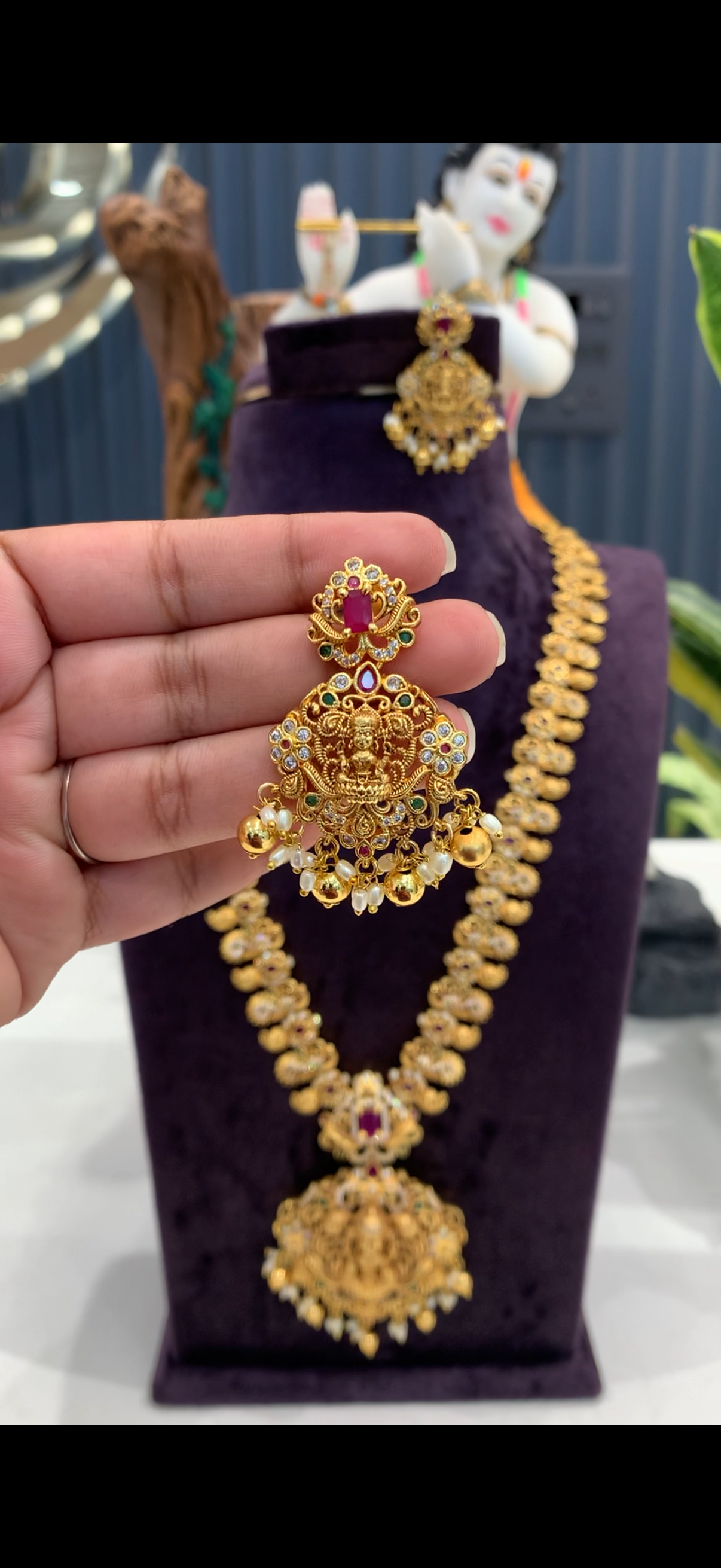 Beautiful peacock design with  lakshmi pendant long haram and pushback earrings