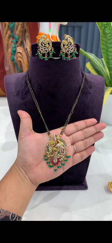 Beautiful peacock locket with 18 inchs black beads