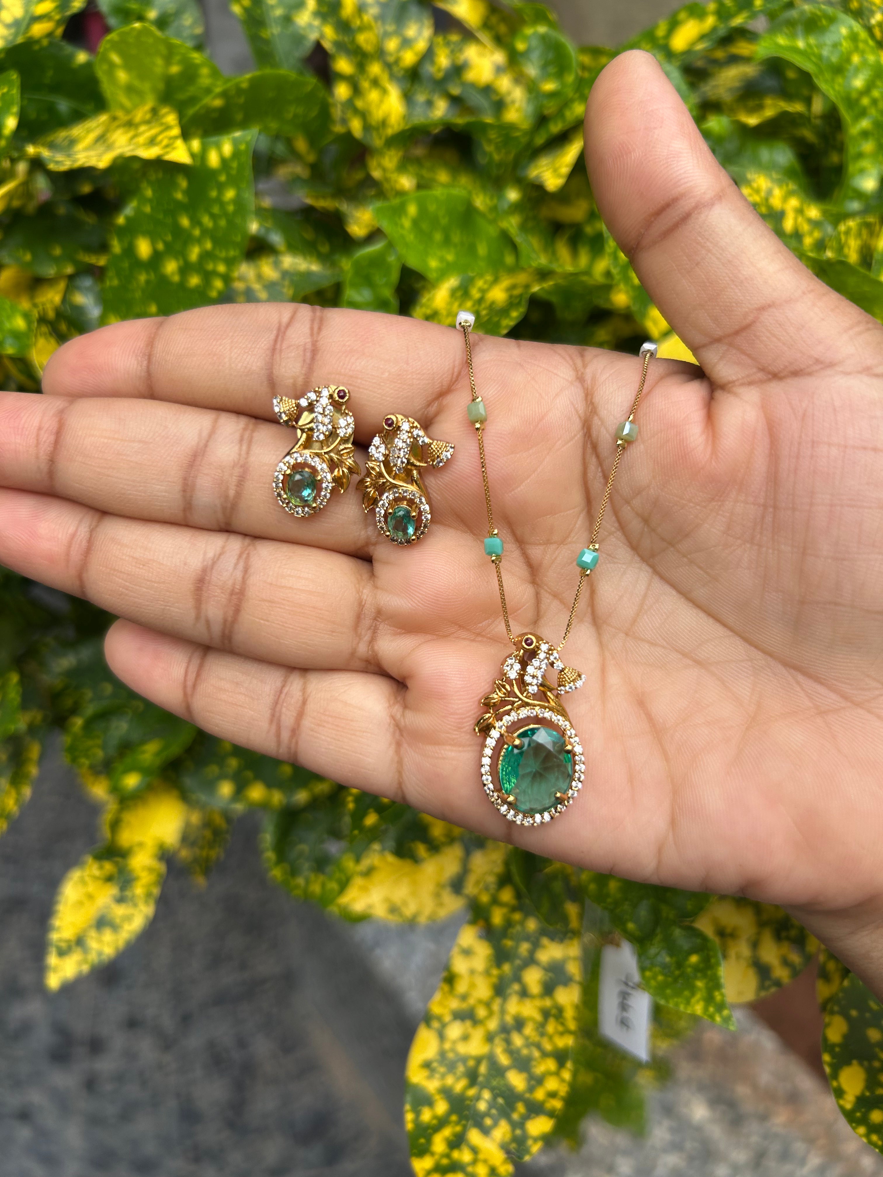 Beautiful peacock design pendant set with fancy chain 18 inchs long