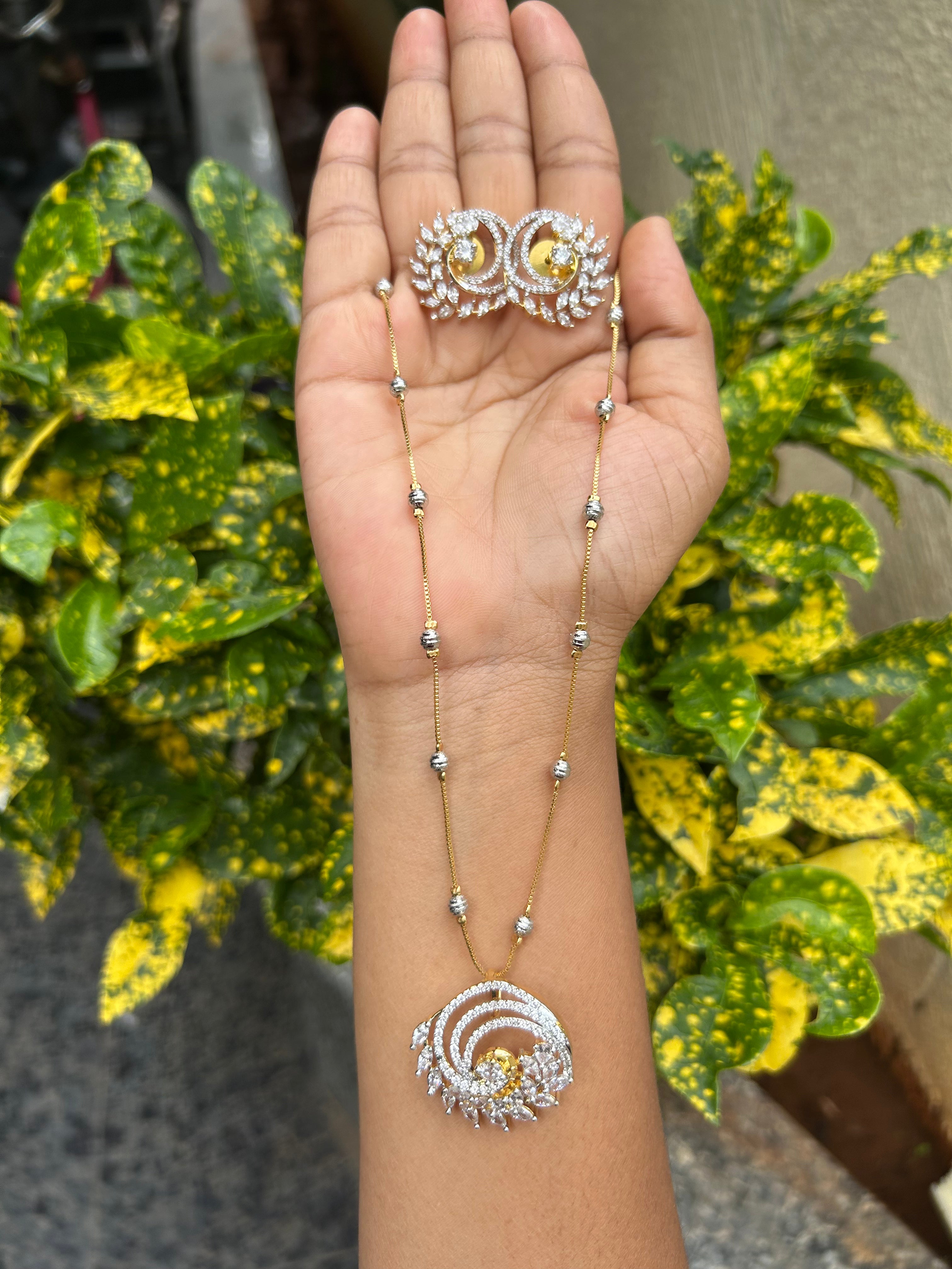 Beautiful simple white stones pendant set with silver balls chain 18 inchs long