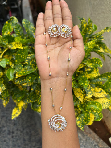 Beautiful simple white stones pendant set with silver balls chain 18 inchs long