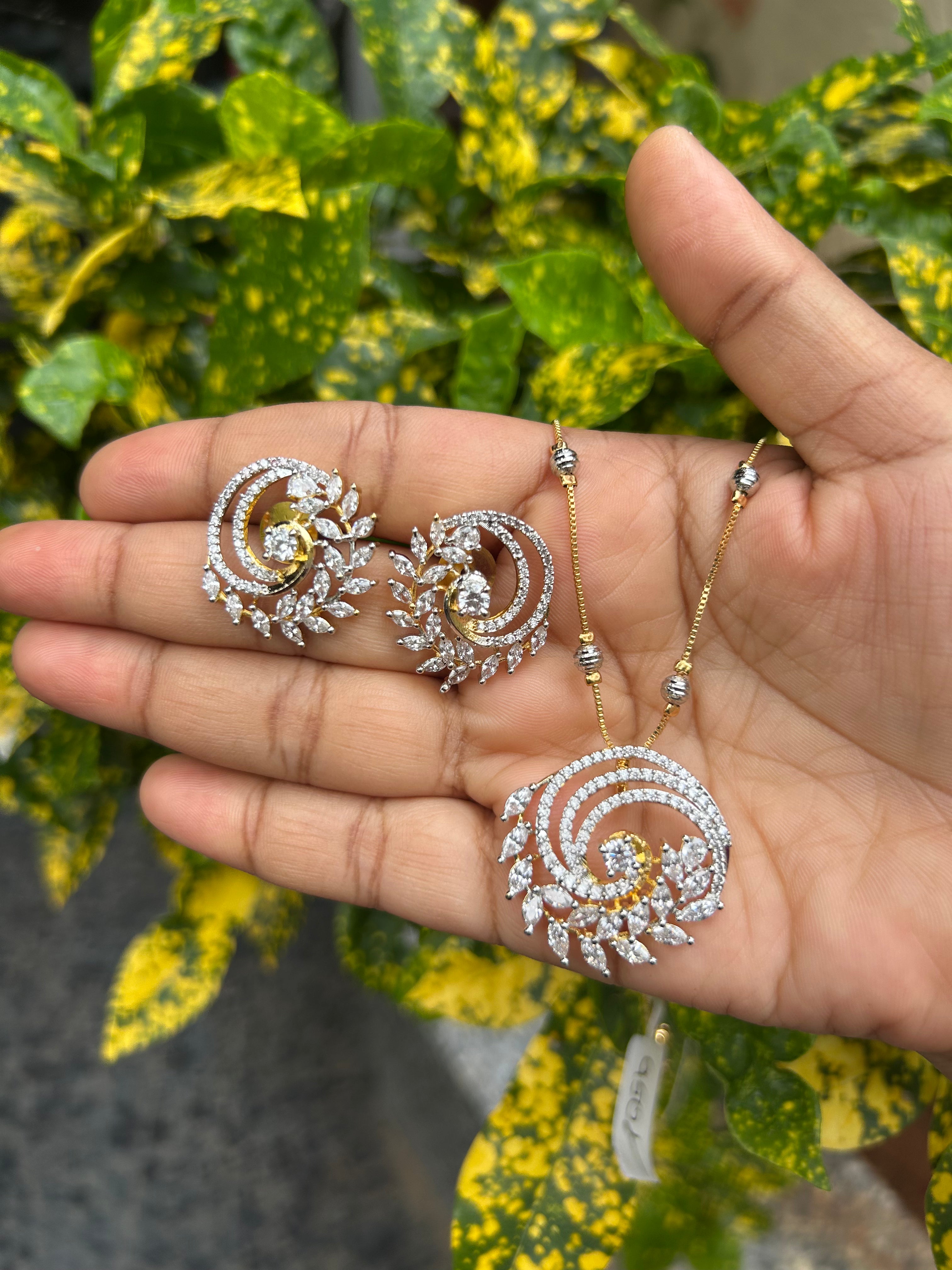 Beautiful simple white stones pendant set with silver balls chain 18 inchs long