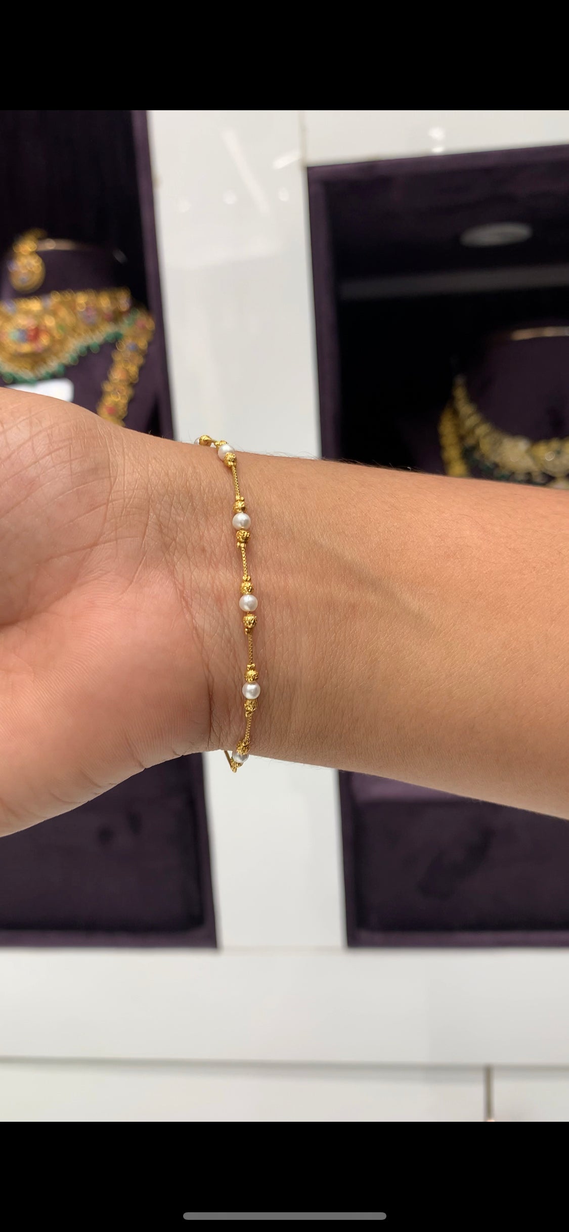 Beautiful hand making bracelet with white pearls