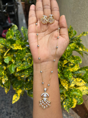 Beautiful white stones pendant set with silver balls chain 18 inchs long