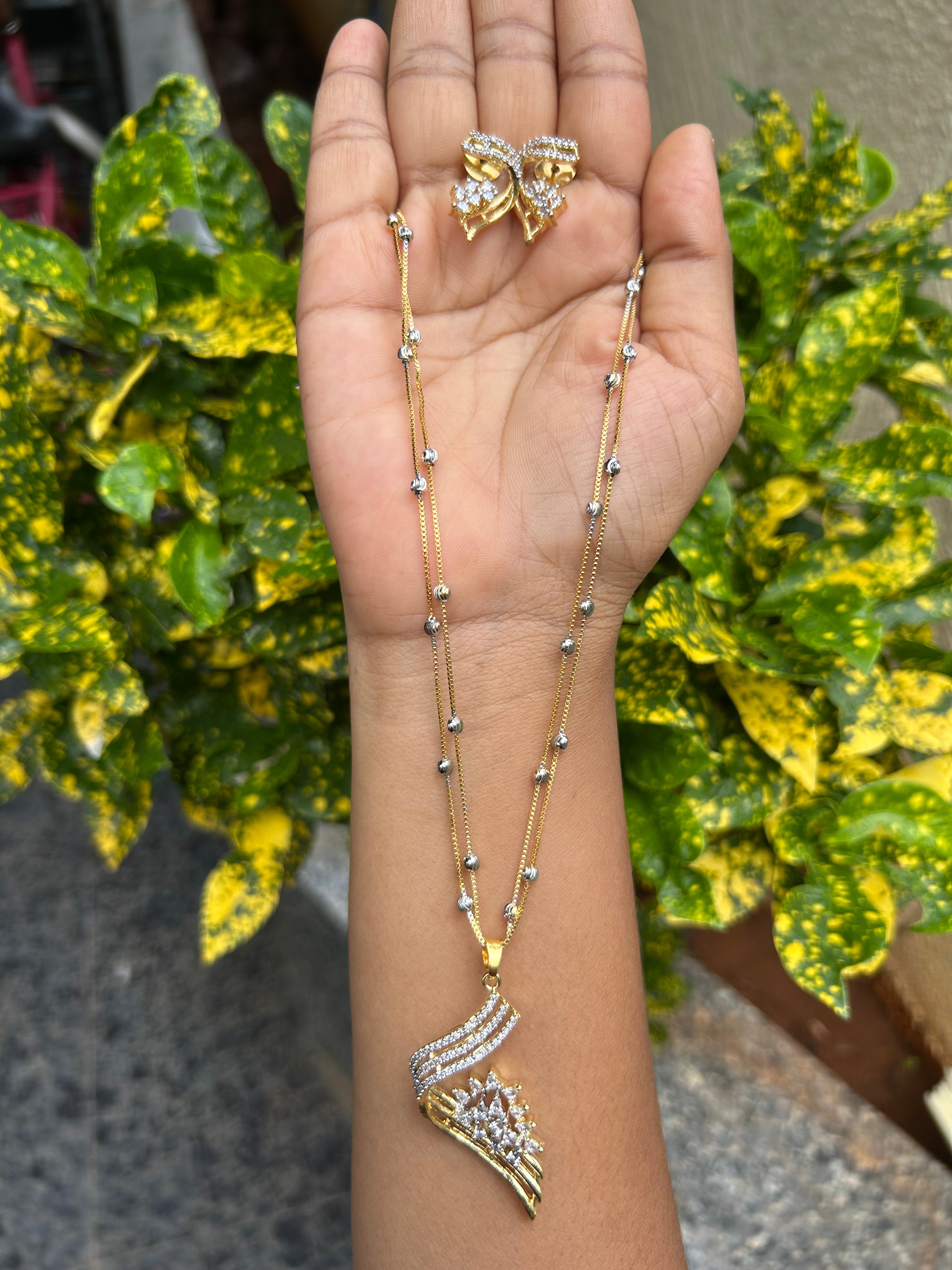 Beautiful white stone pendant set with 2 layers silver balls chain 18 inchs long
