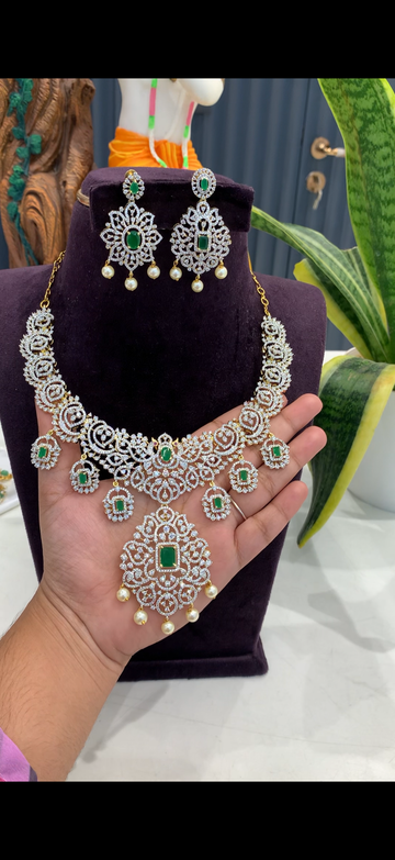 Beautiful GJ polish necklace set with screwback earrings